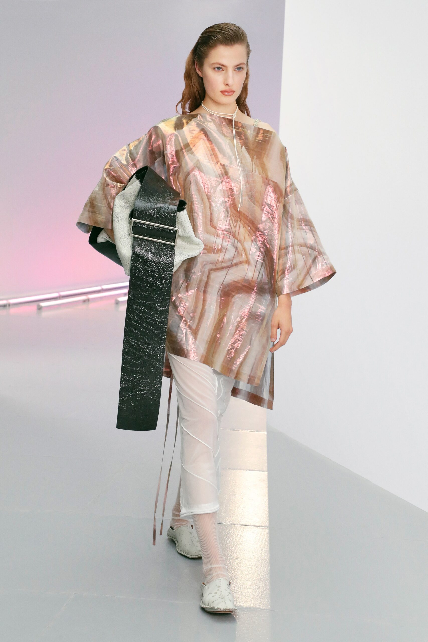 shiny layered top with fitted pants