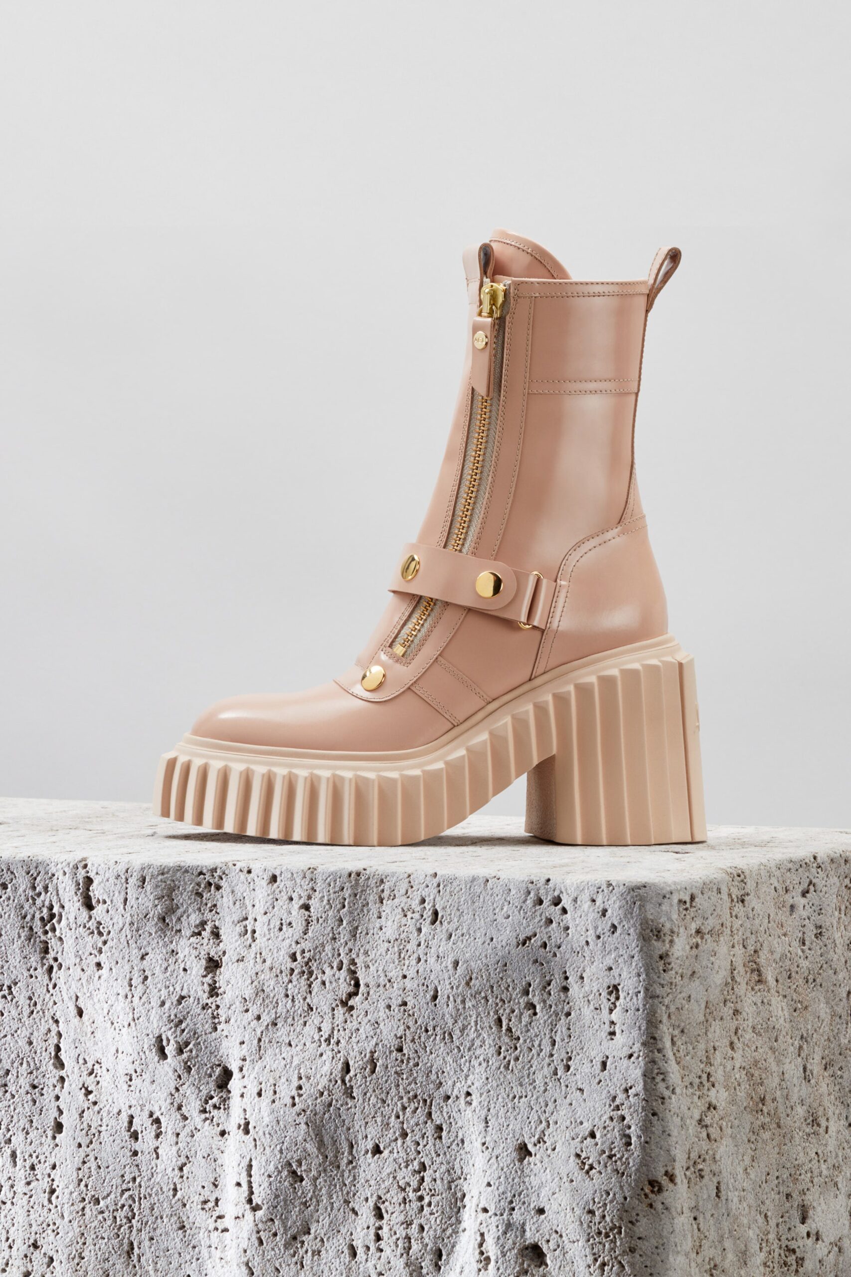 beige leather zippered boots