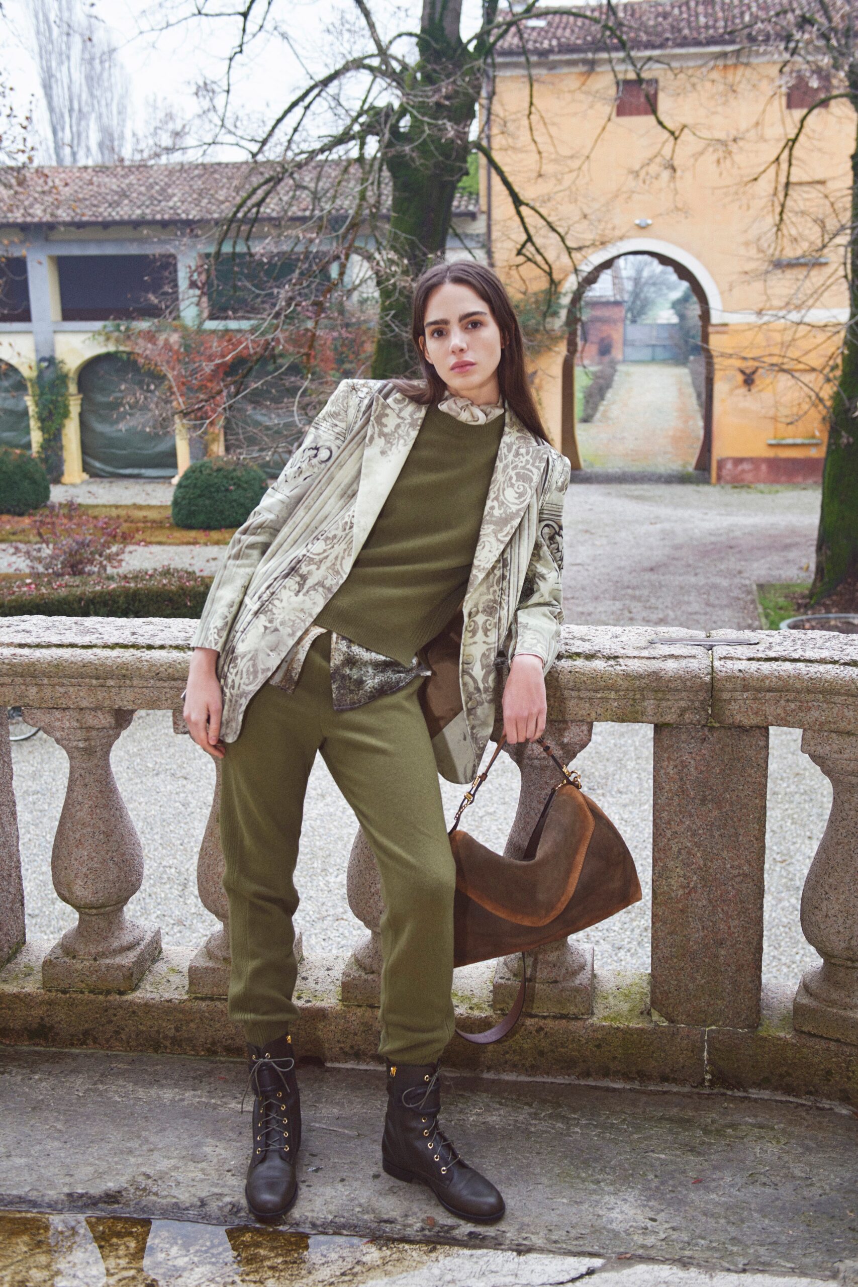 beige printed blazer with green top