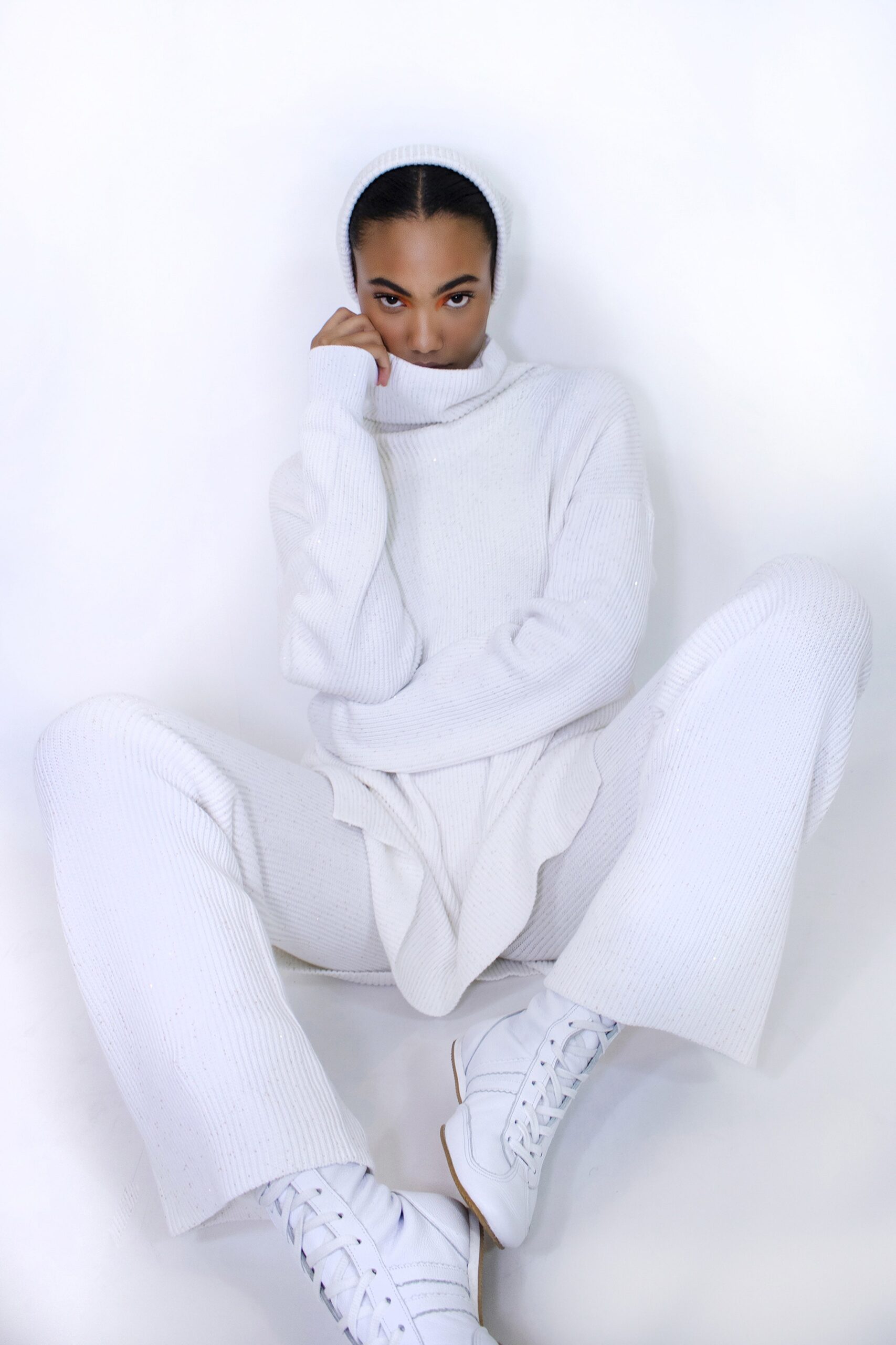 white relaxed sweater and pants