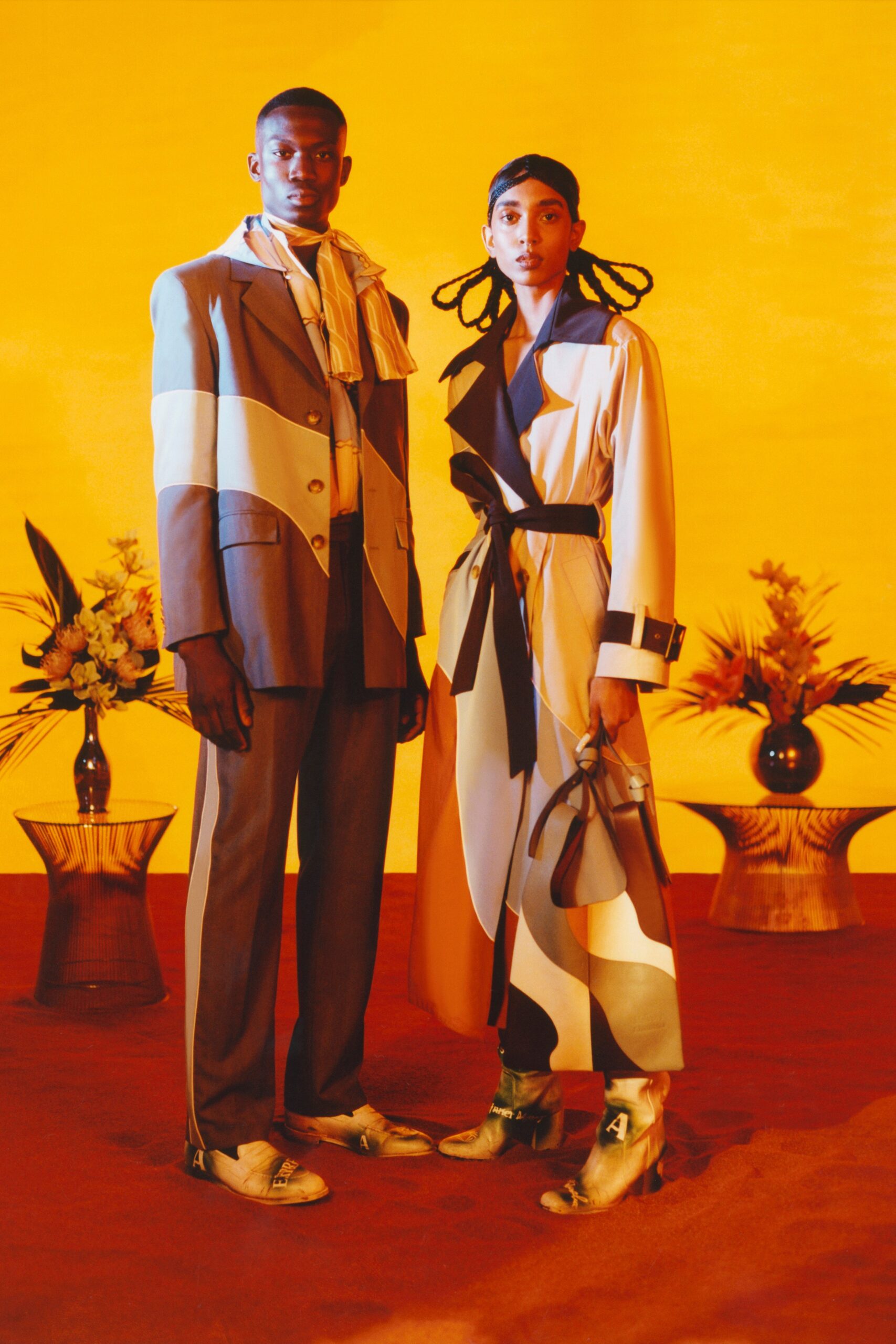 beige coat and gray suit