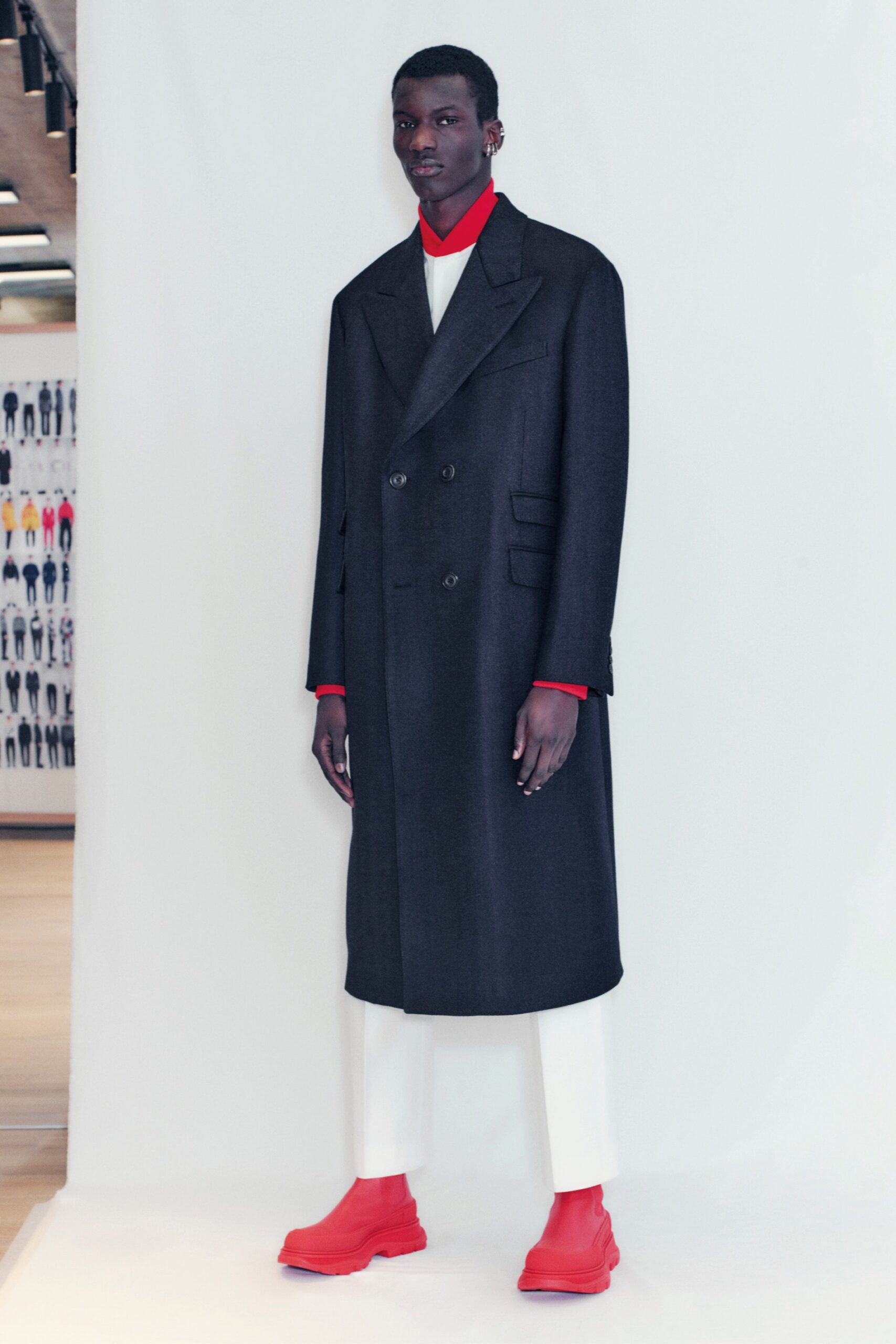 black wool tailored coat with red top