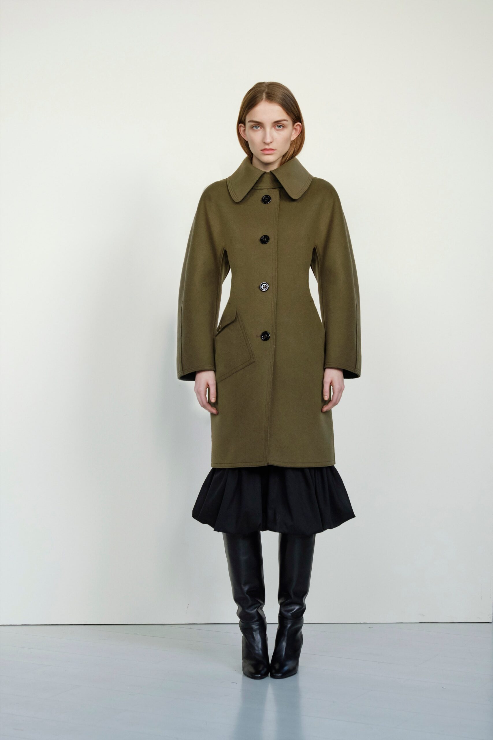 green wool coat with black dress