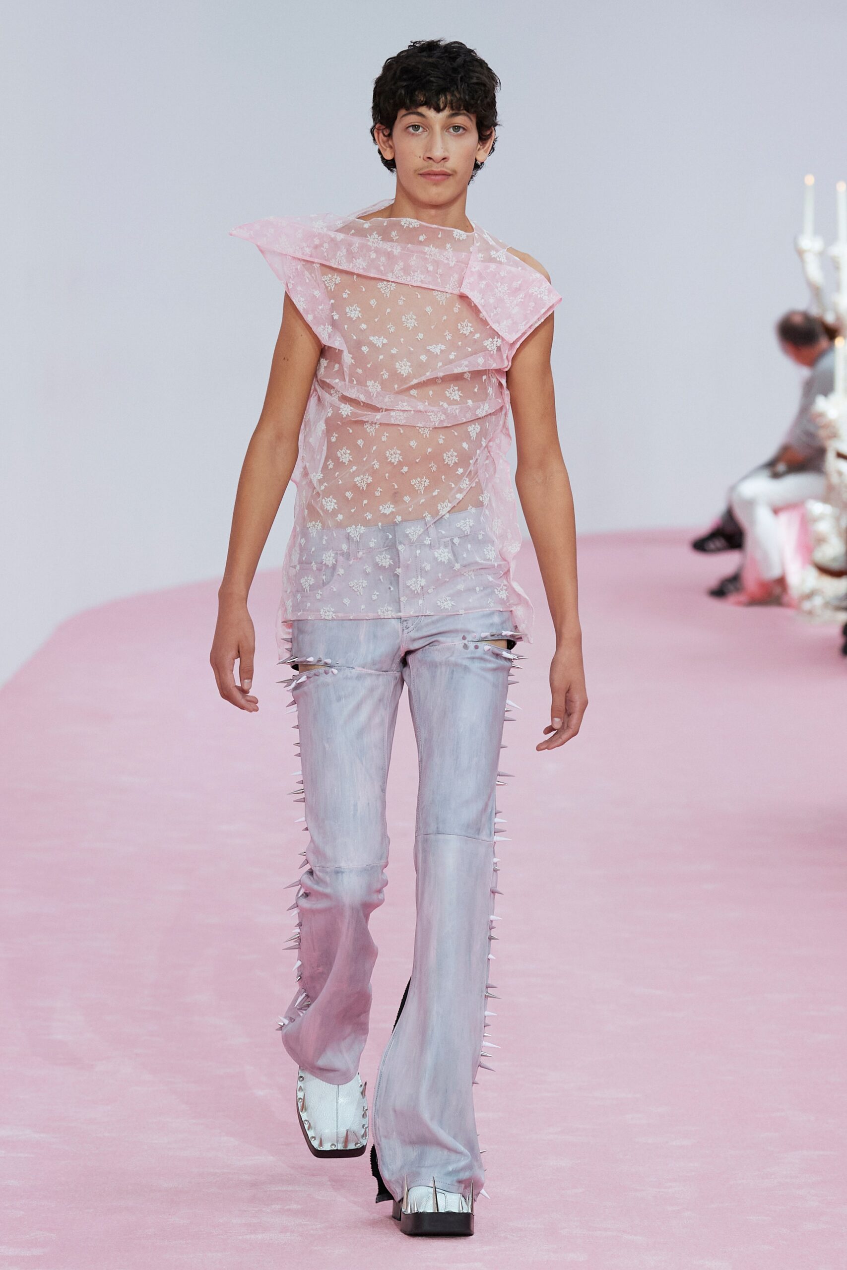 pink sheer embroidered top with denim pants