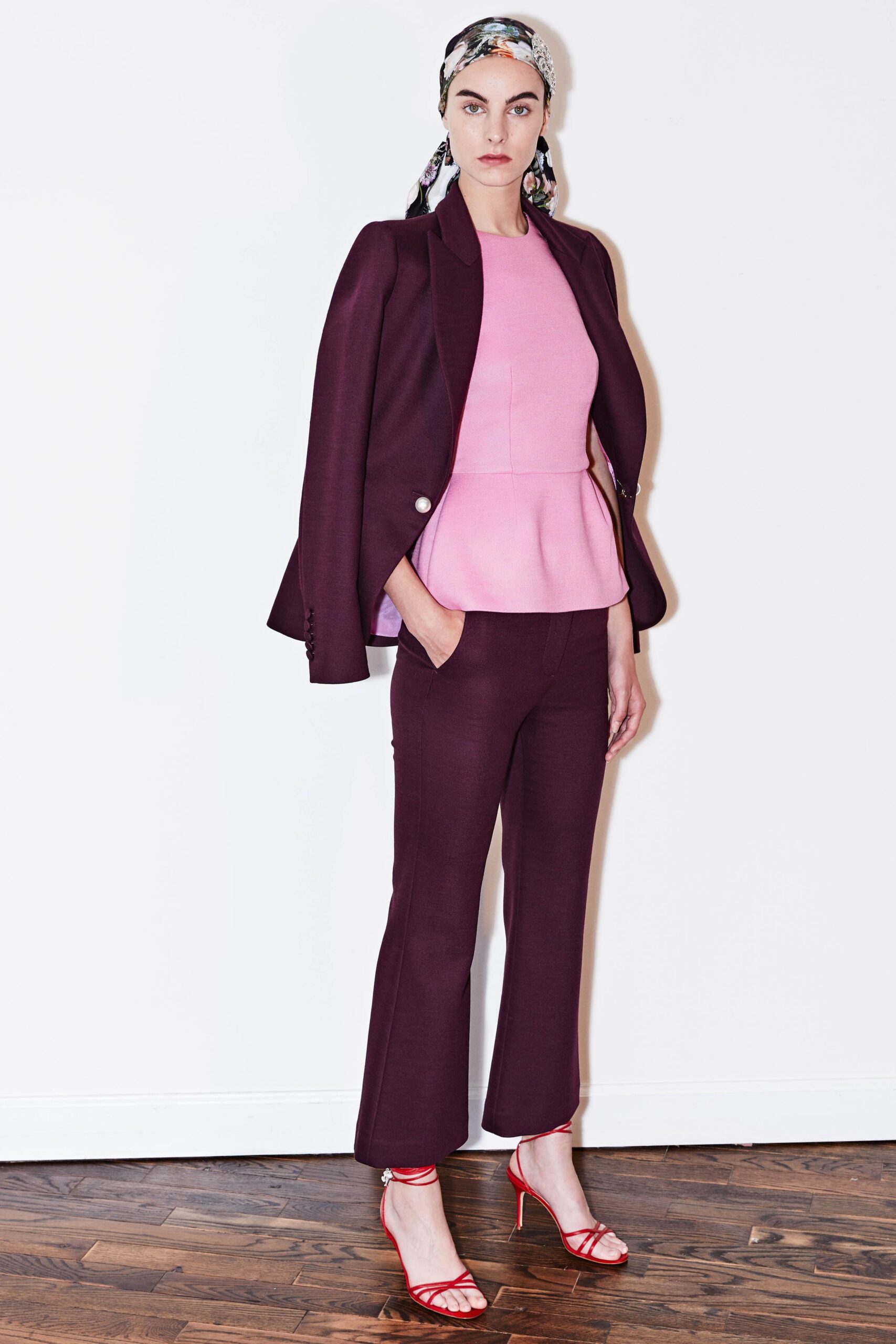 pink cotton sleeveless high-neck fitted flared top
