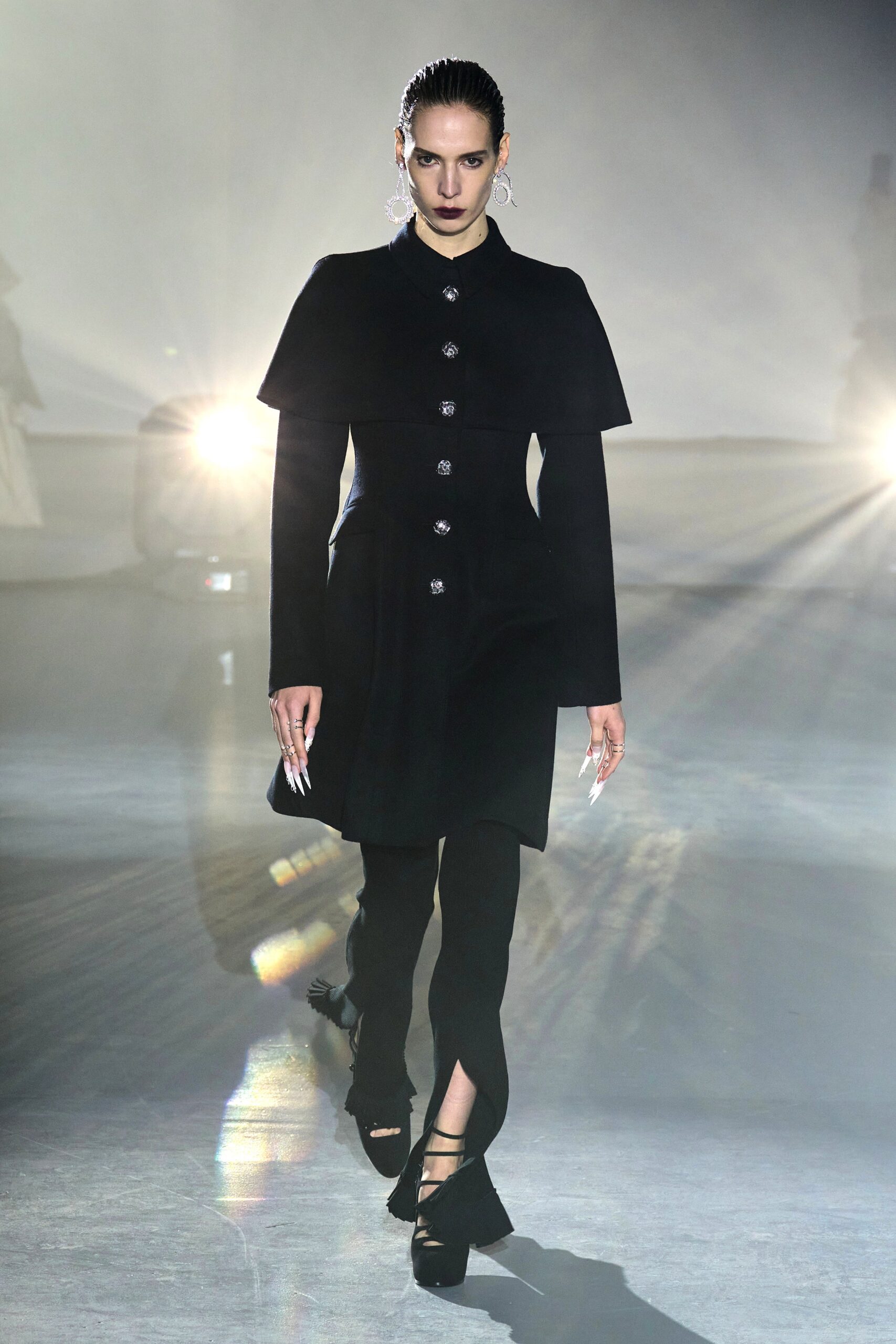 black fitted coat and pants