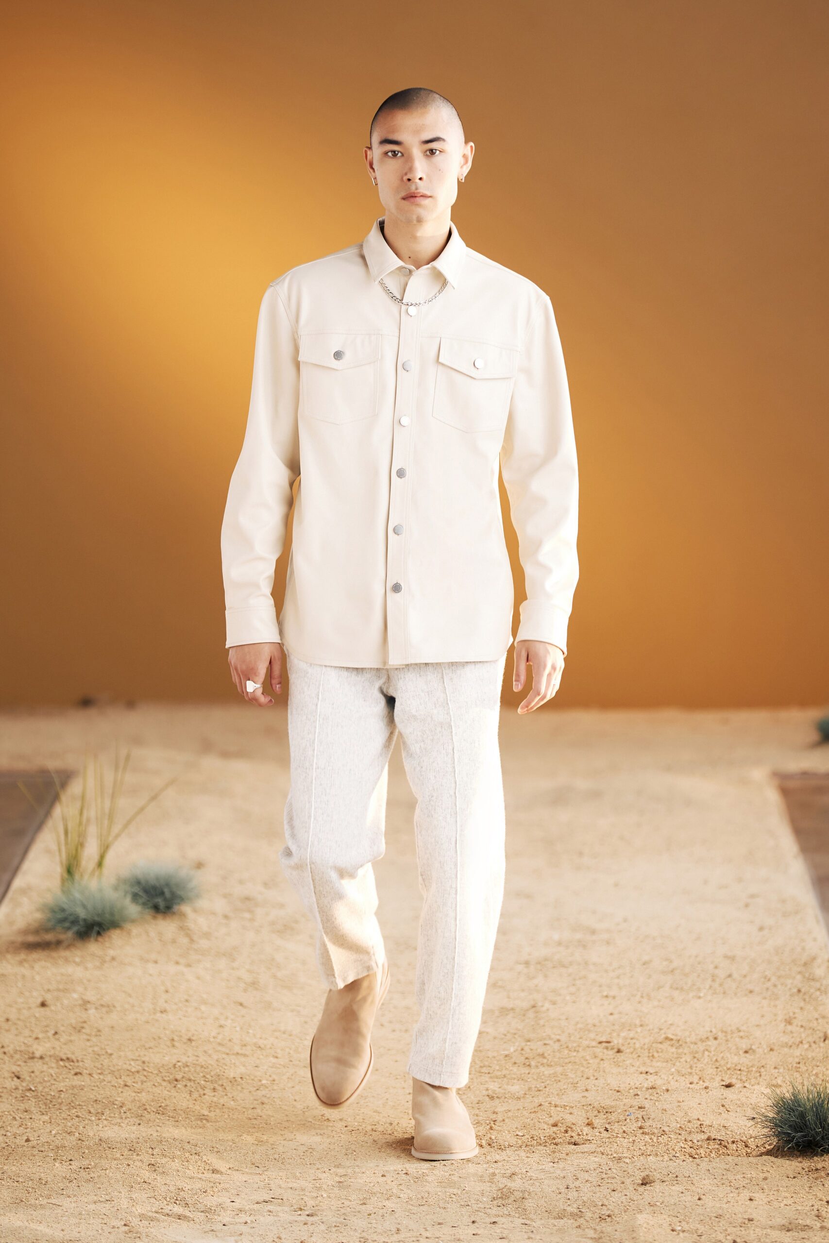 beige cotton shirt with tailored pants