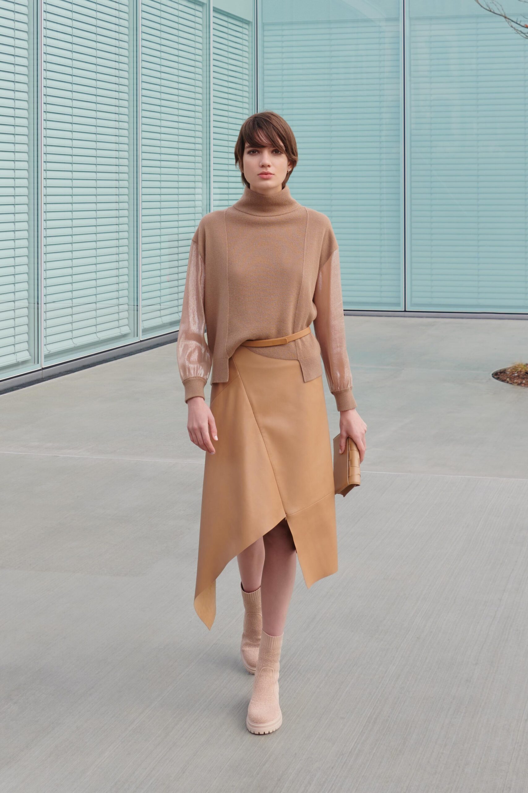 beige wool long-sleeve turtleneck fitted layered sweater