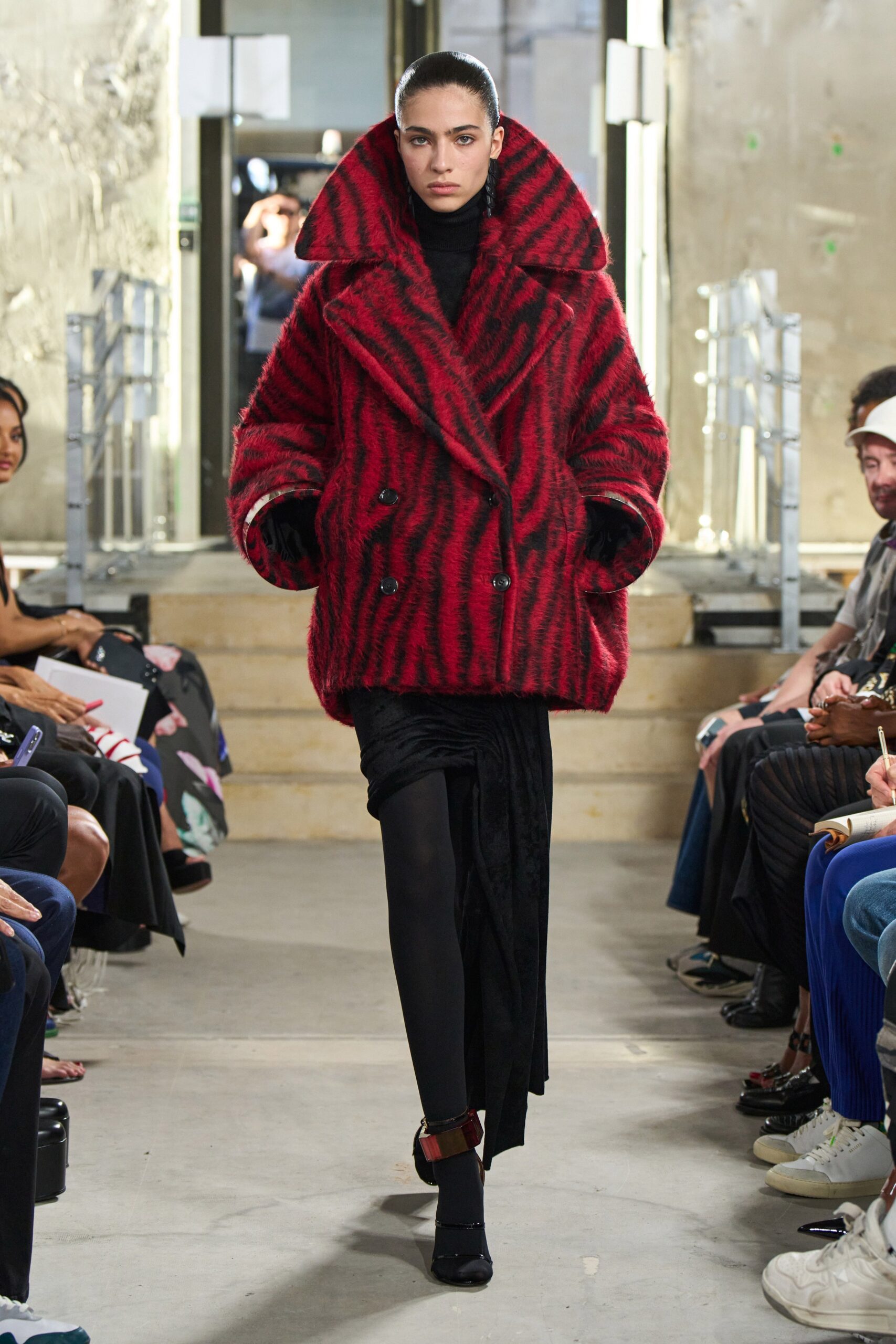 oversized red striped coat and black dress