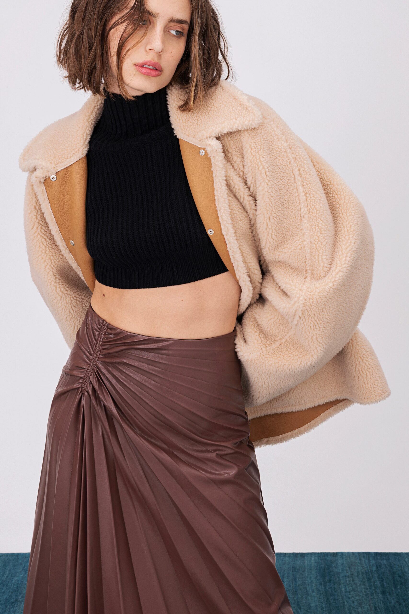 brown vinyl fitted pleated shiny skirt