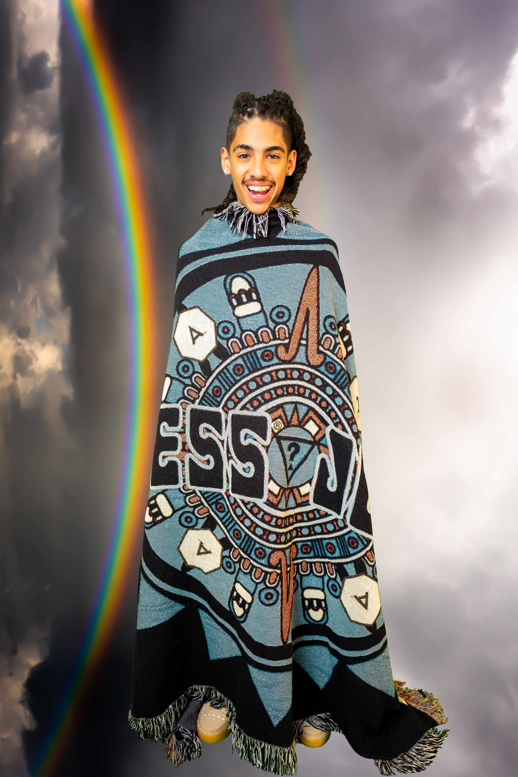 blue and black embroidered poncho