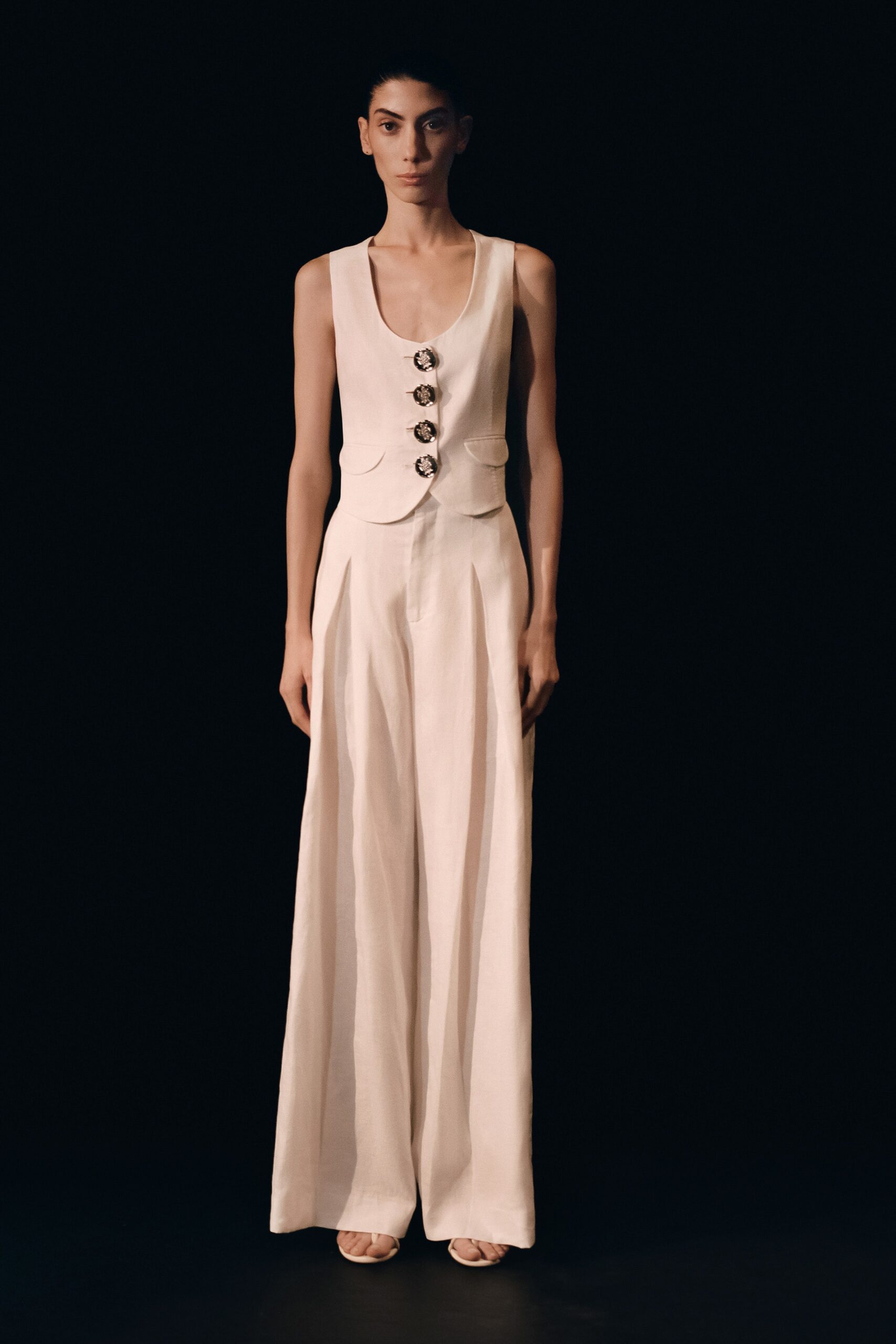 white fitted sleeveless jumpsuit
