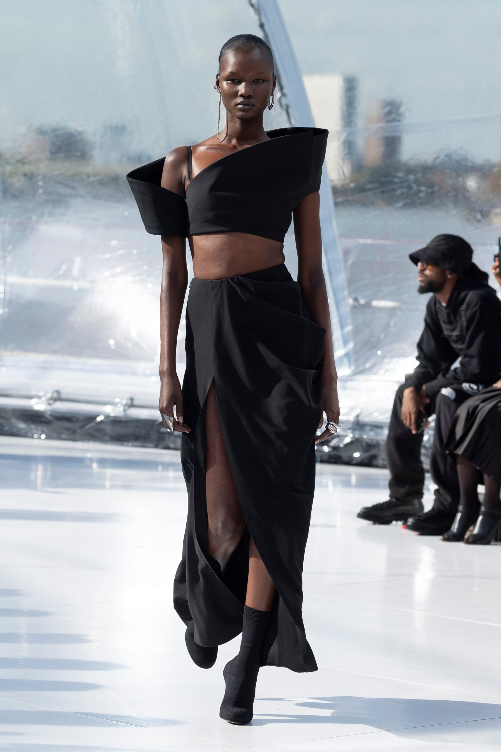 black fitted crop-top and midi skirt