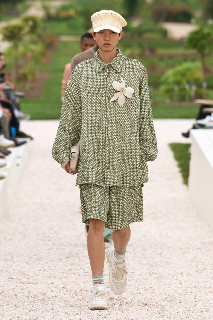 A relaxed green printed shirt with long sleeves paired with matching shorts.
