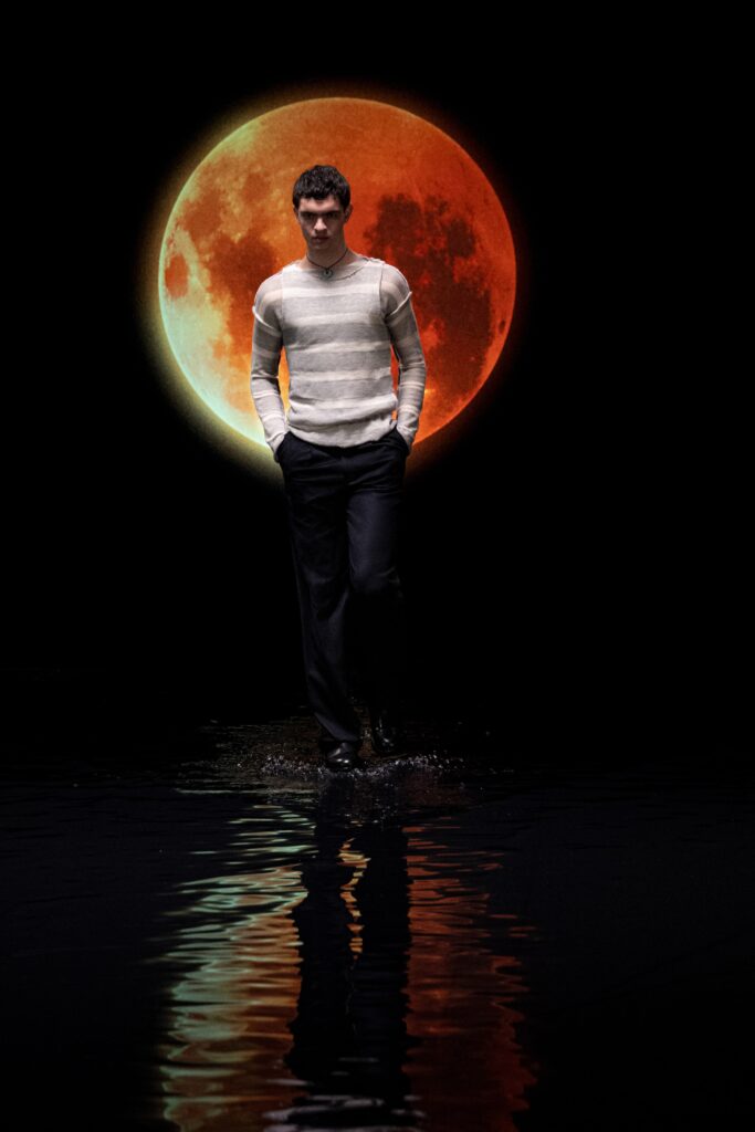 striped sweater and tailored pants