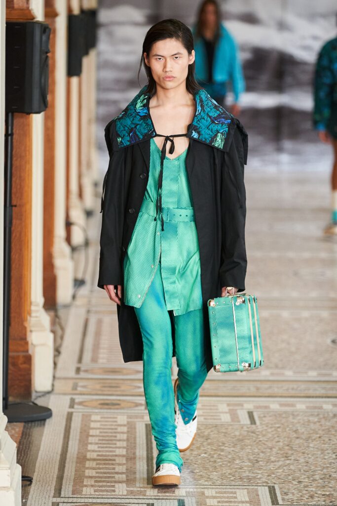 black coat teal top pants