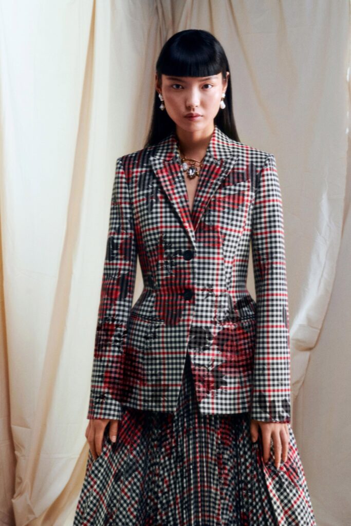 tailored checked blazer and pleated skirt