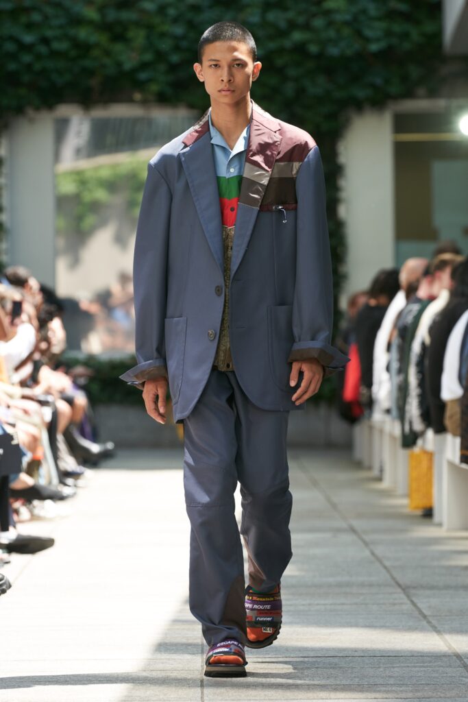 A relaxed blue color-blocked jacket with long sleeves paired with matching pants.