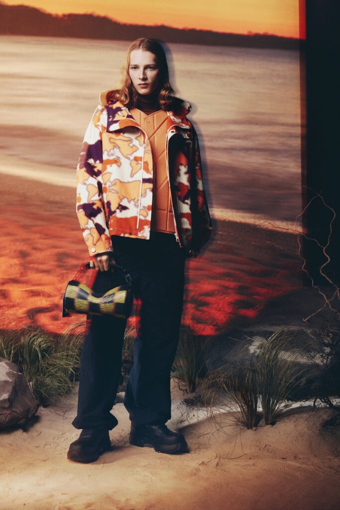 A relaxed fit multicolor printed jacket paired with black pants, perfect for a casual look.
