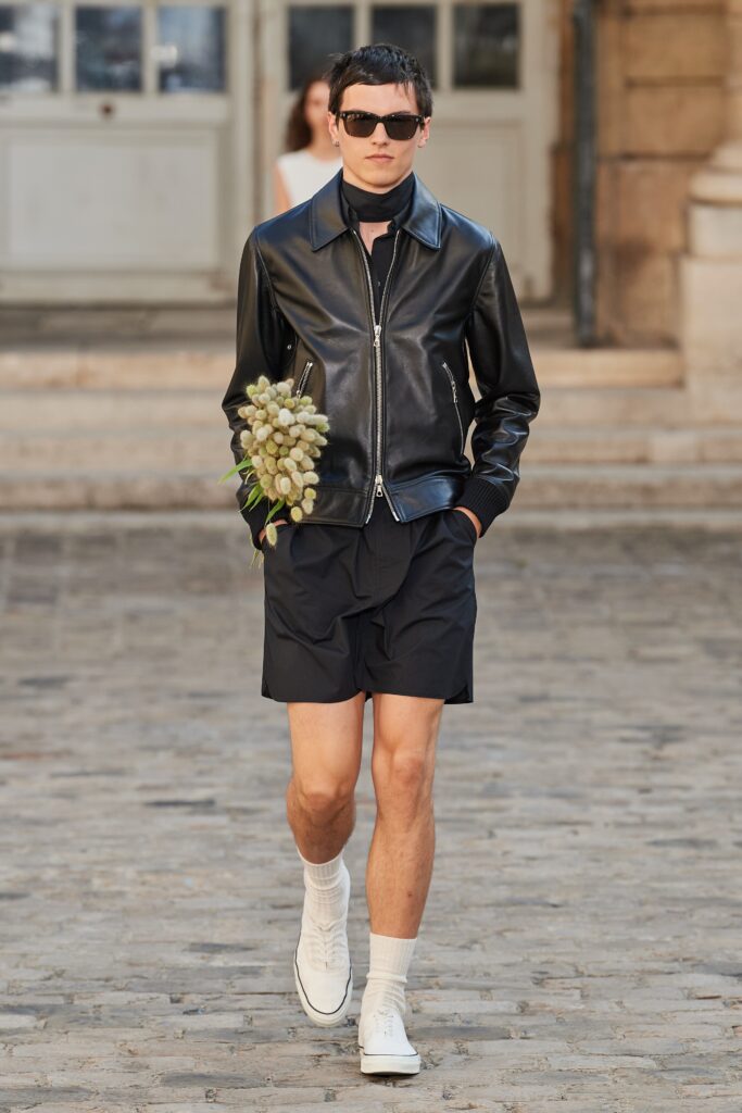 black leather fitted jacket with shorts