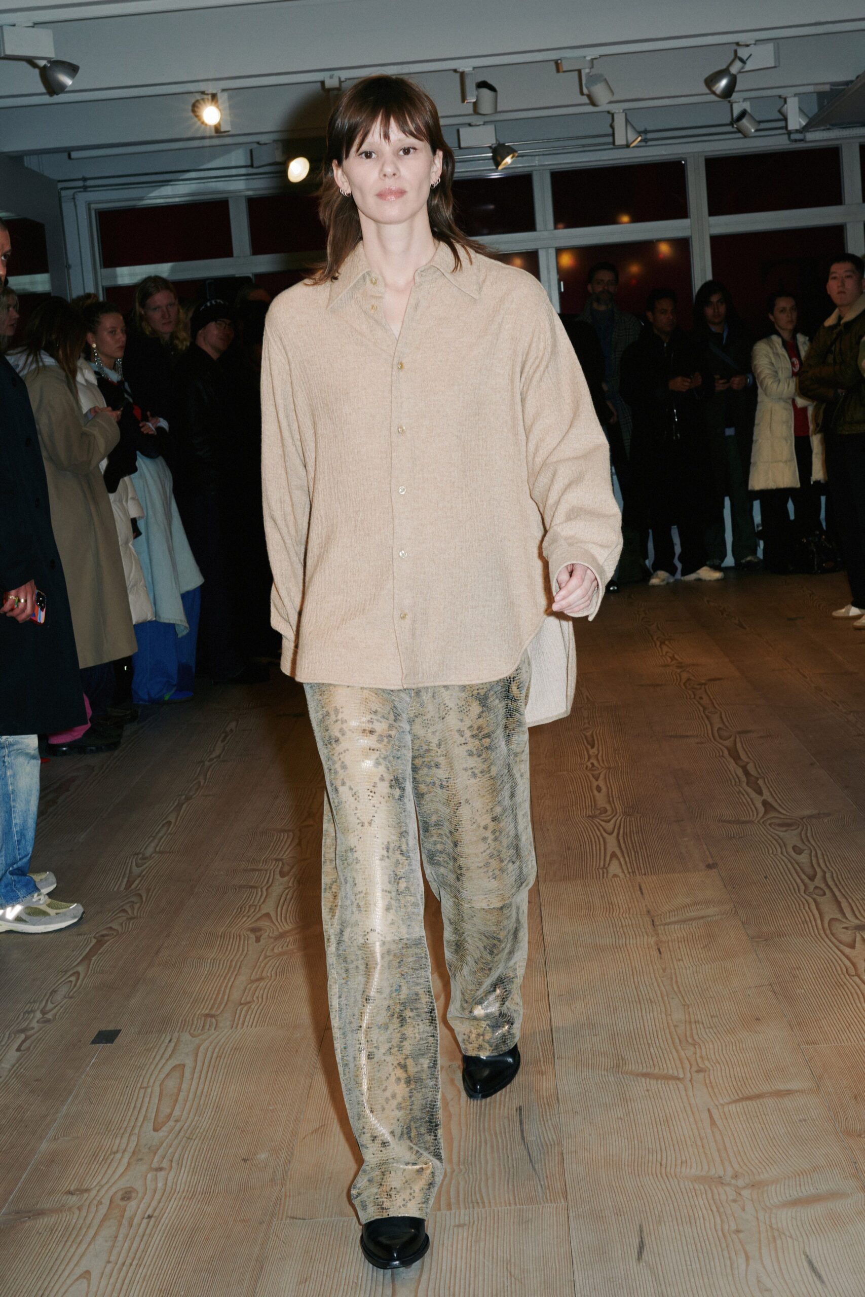 beige cotton shirt and gold silk pants