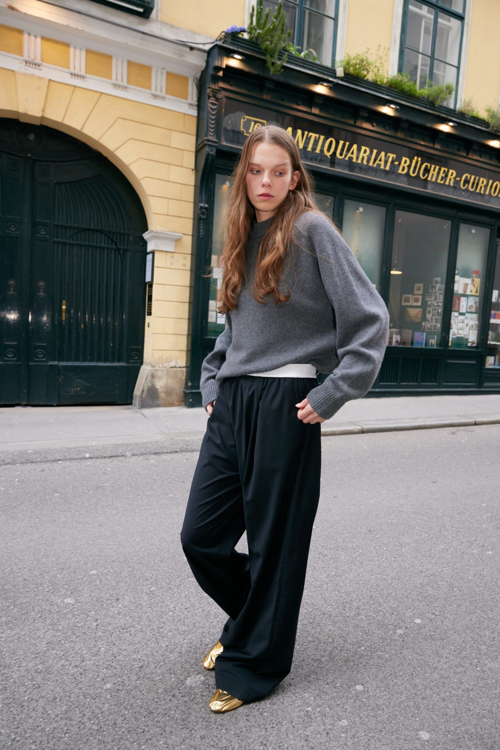 gray wool sweater with black pants