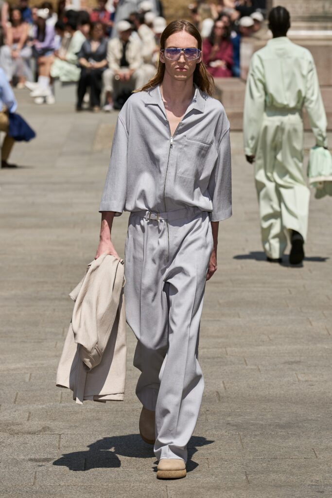 A relaxed gray cotton shirt with long sleeves and a collared design, paired with matching pants.