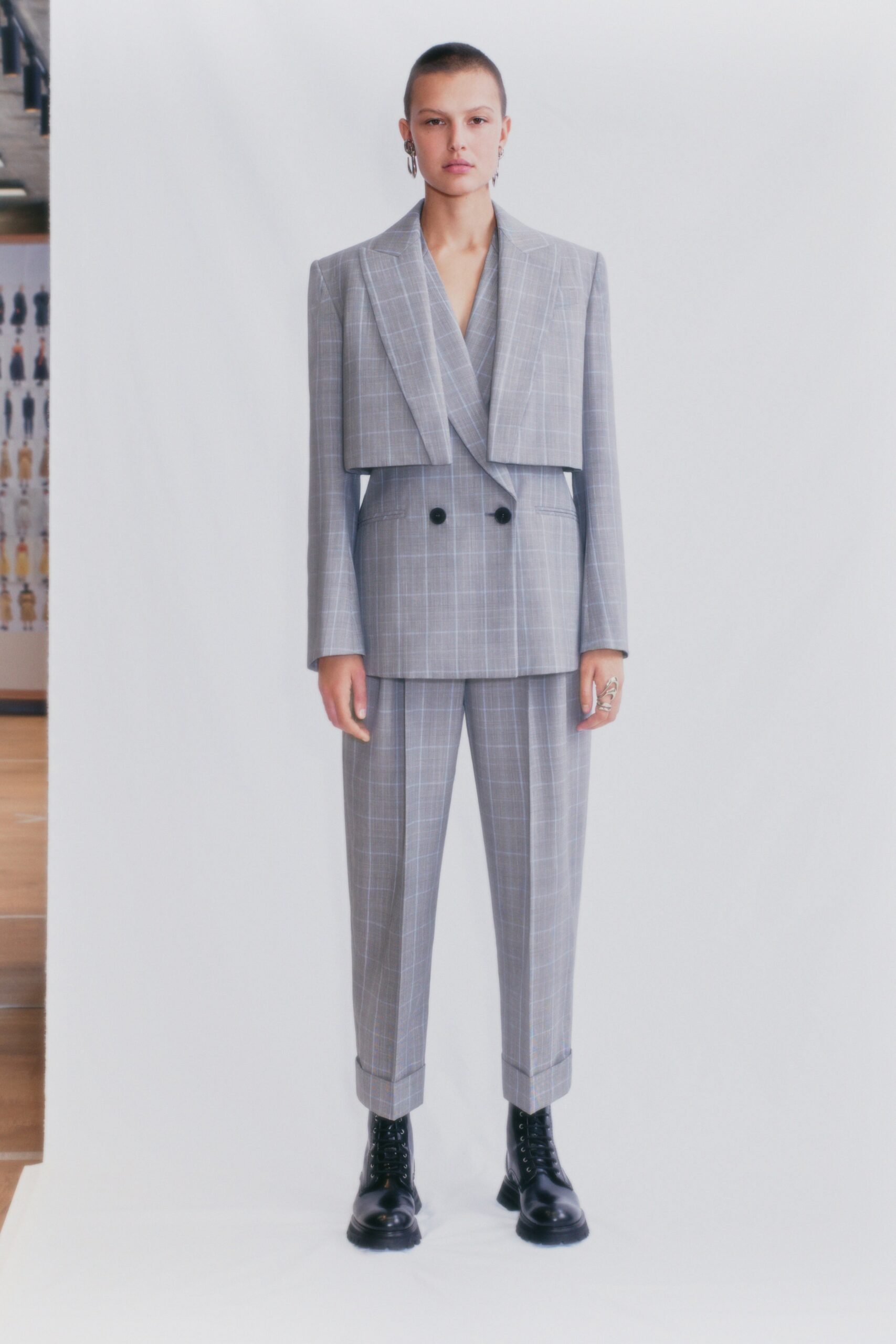 gray tailored suit with boots