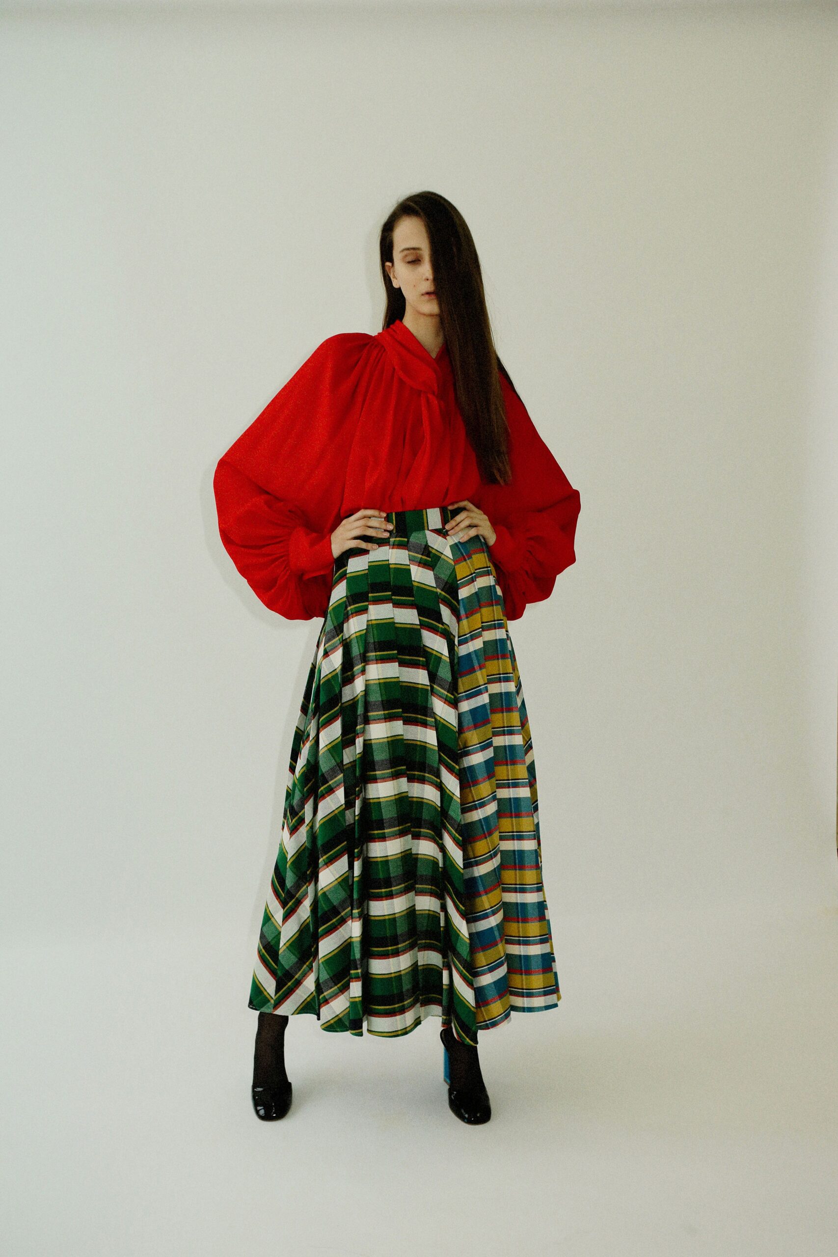red relaxed blouse with tiered maxi skirt