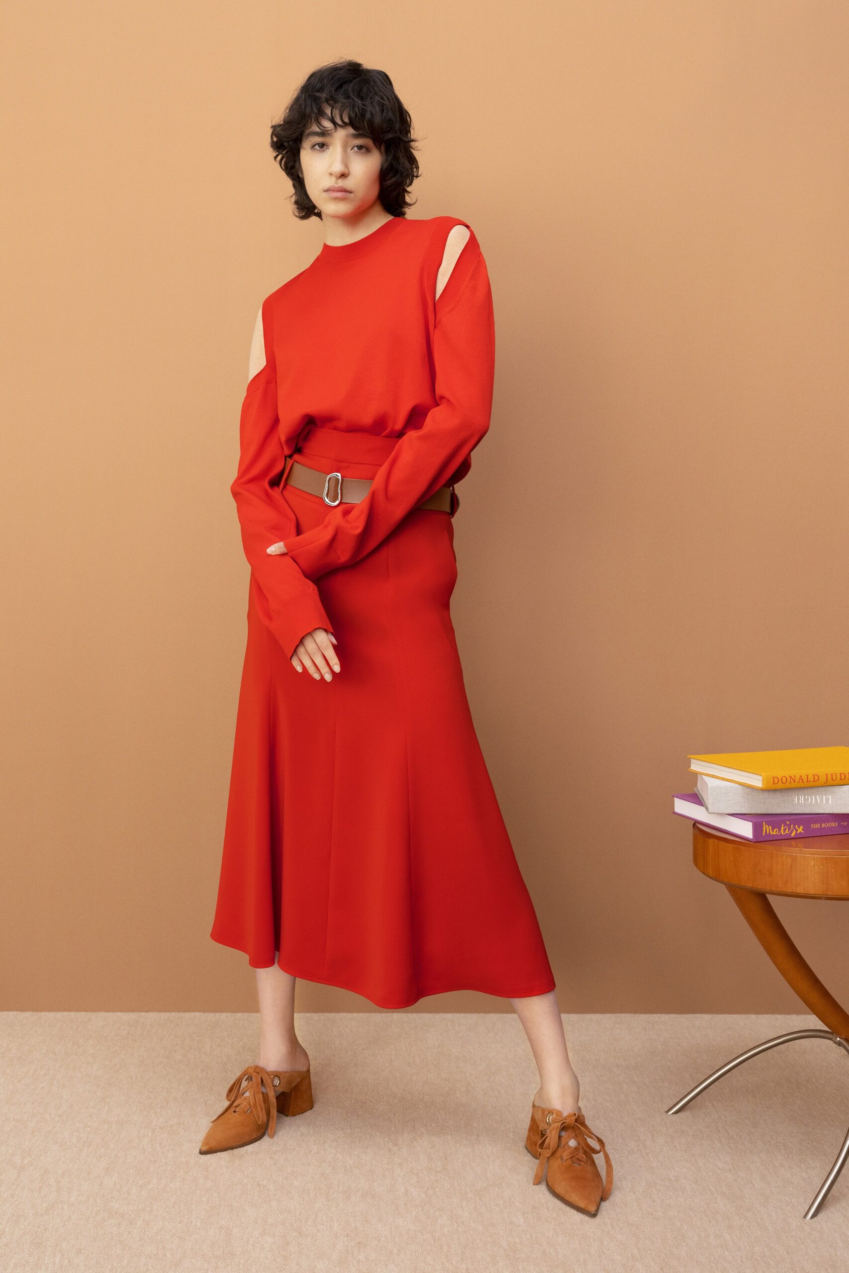 red fitted midi dress with cutouts