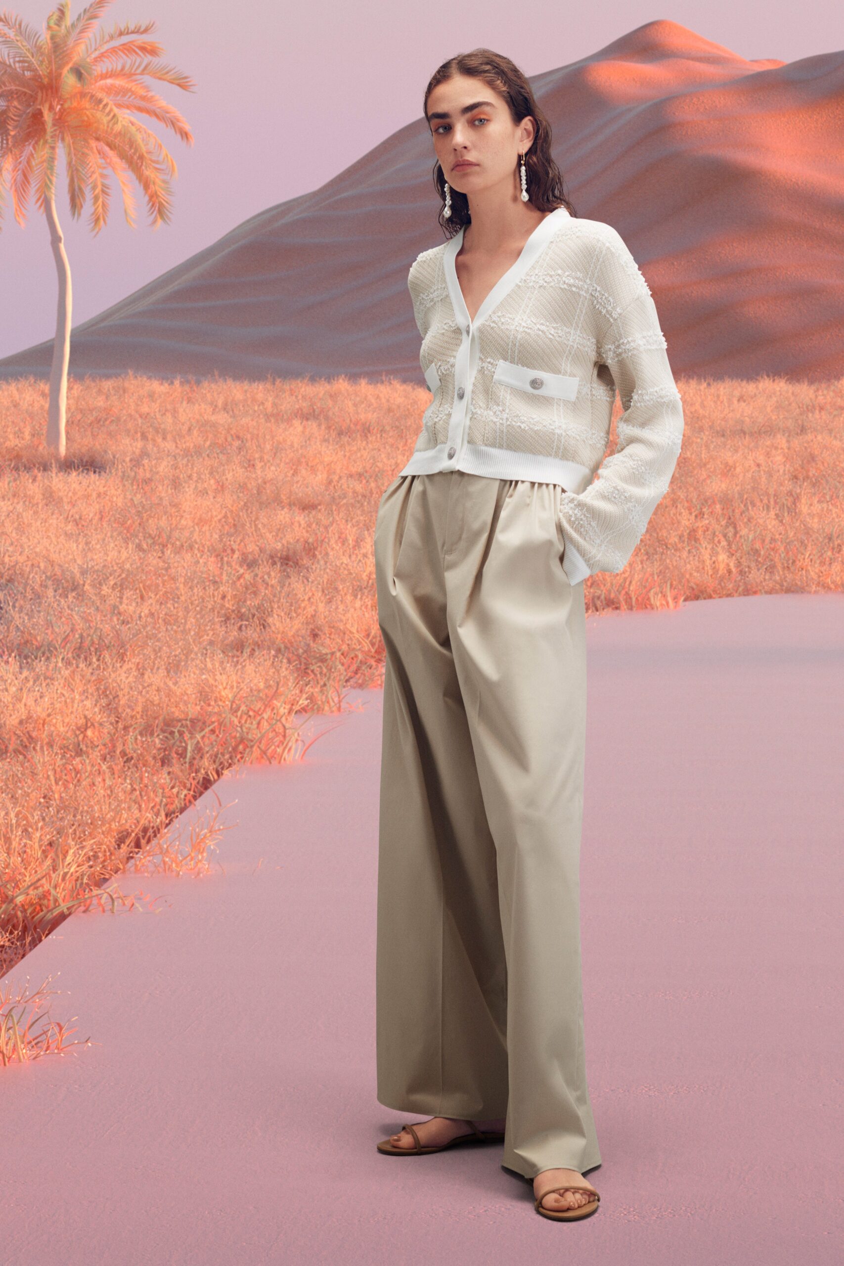 white cotton relaxed top with beige pants