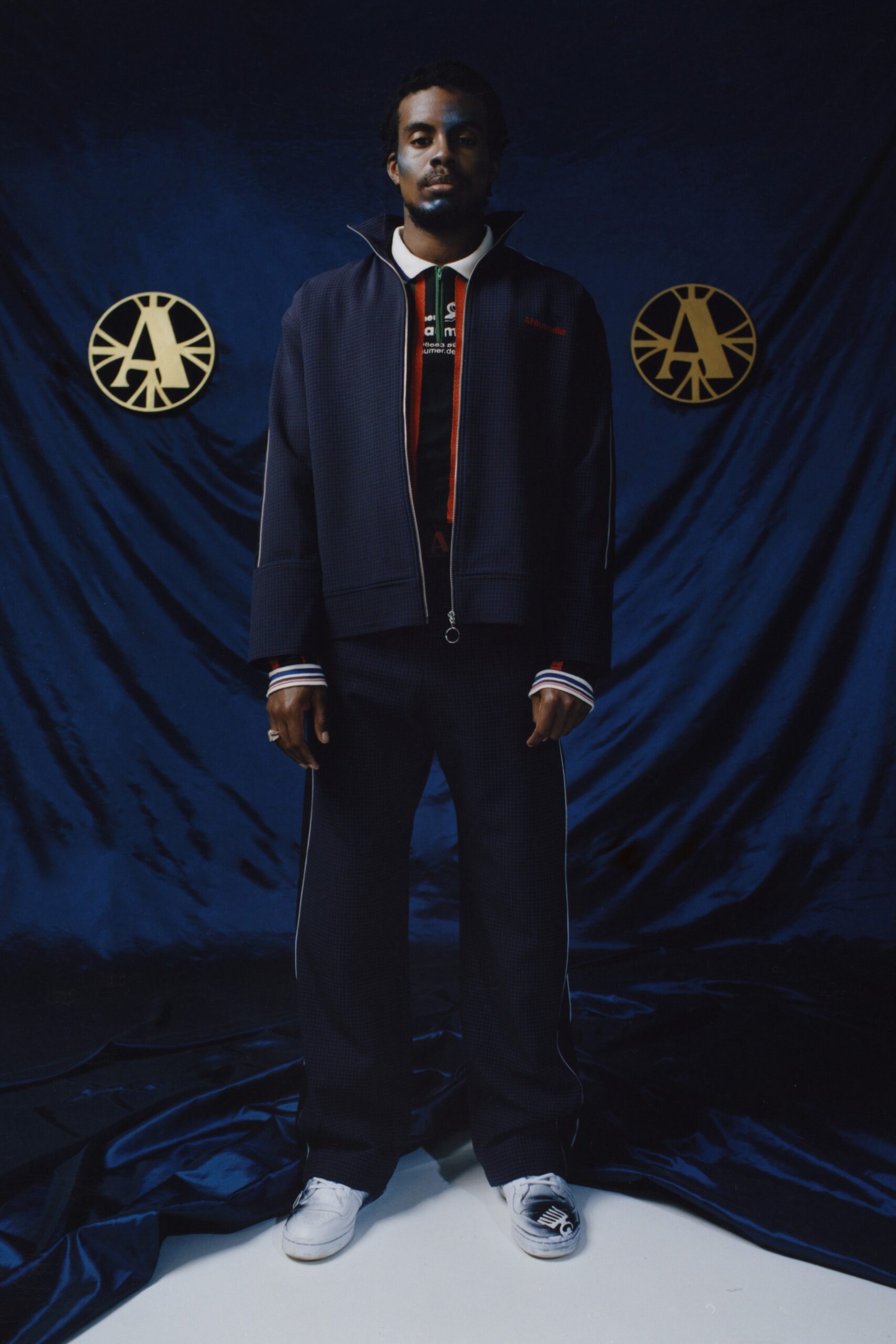 navy relaxed jacket with red t-shirt