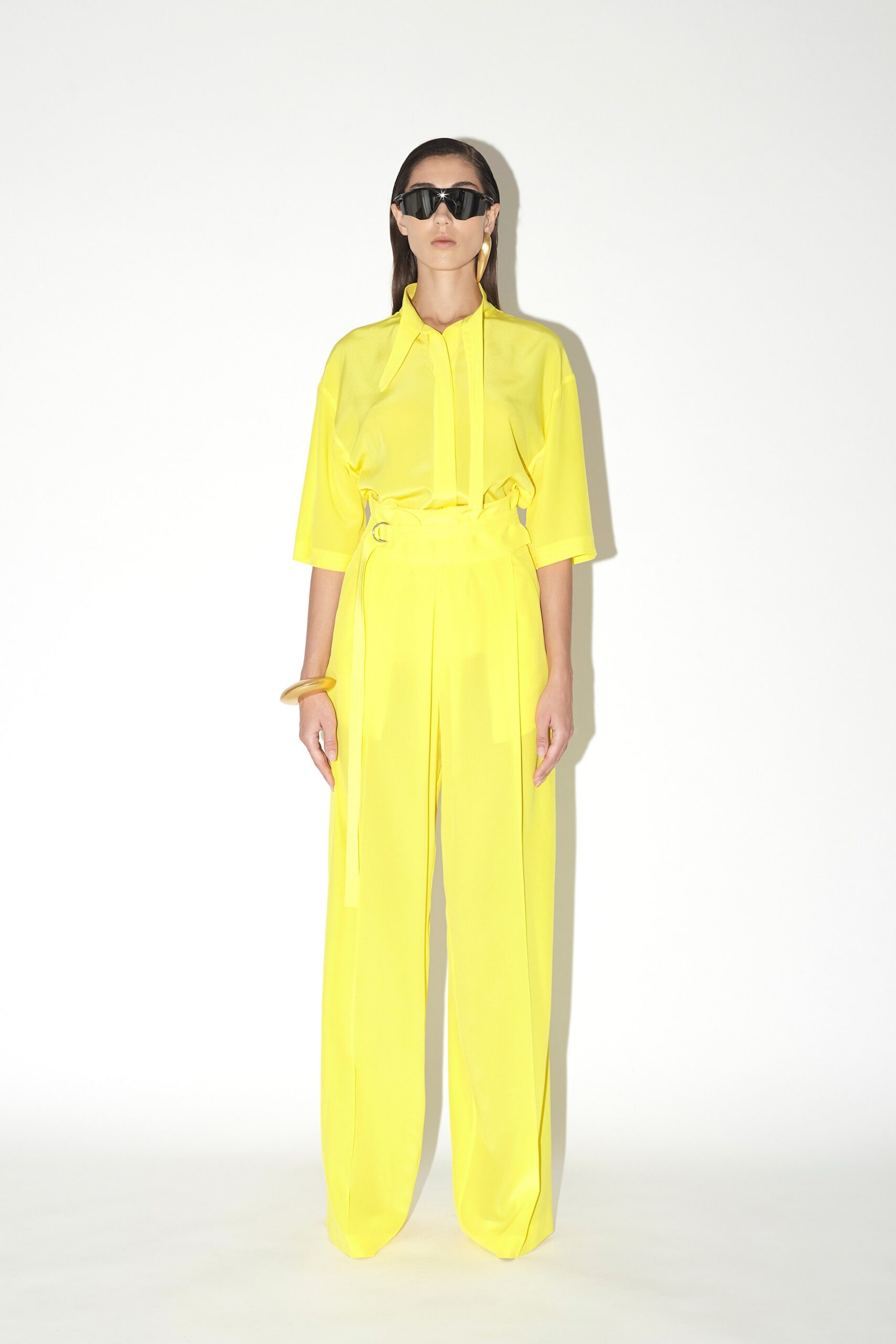 yellow relaxed shirt and fitted pants