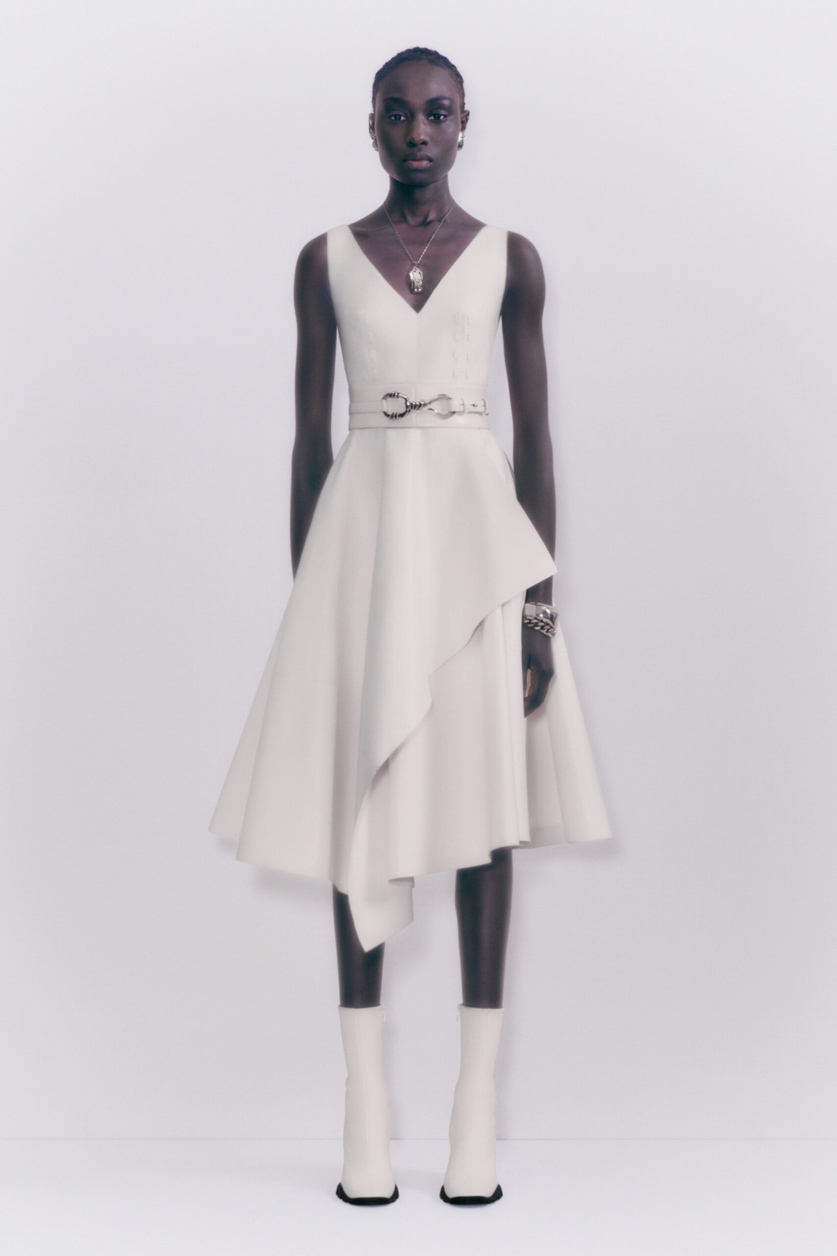 white silk asymmetric dress with boots