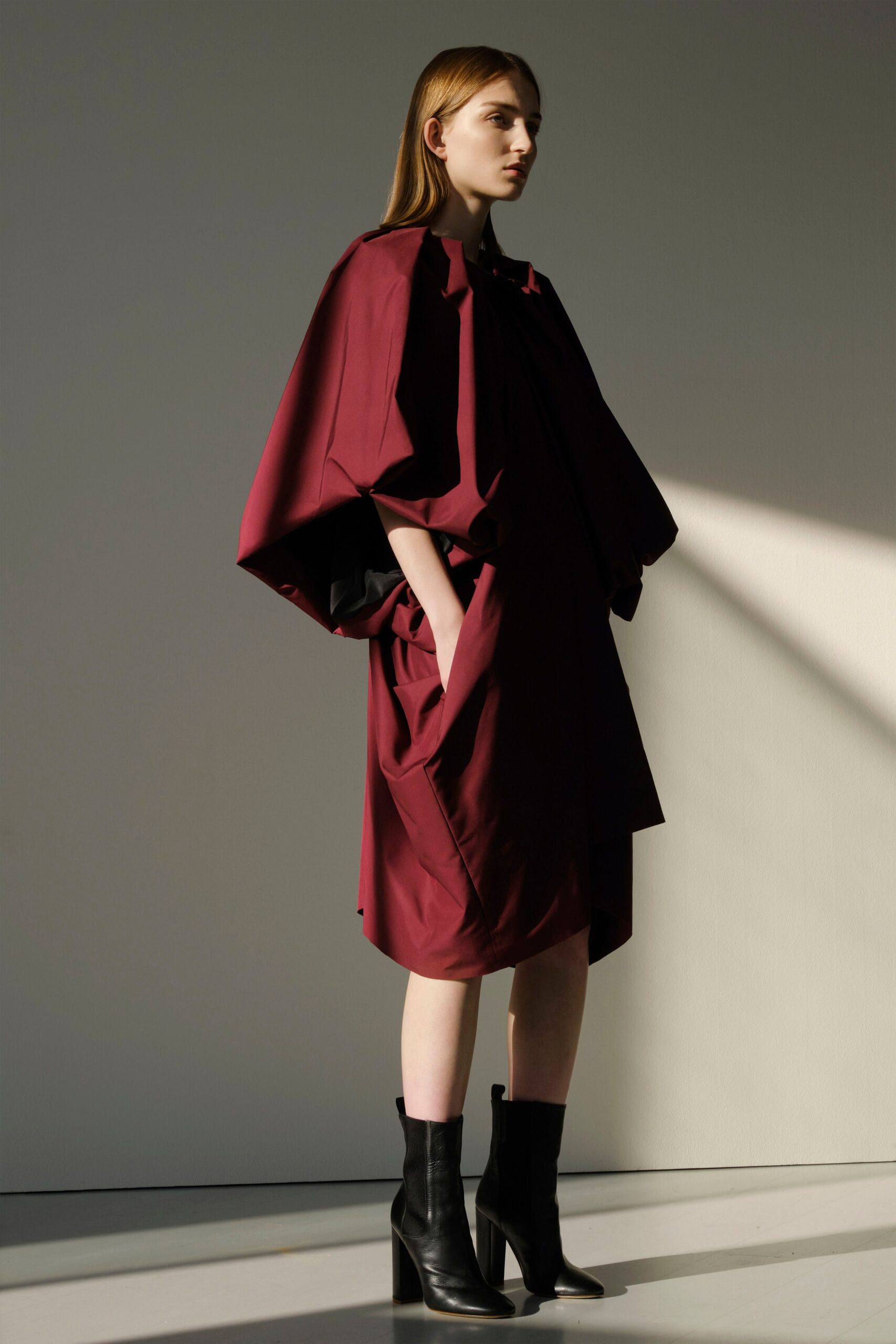 red cotton sleeveless high-neck relaxed draped pockets dress