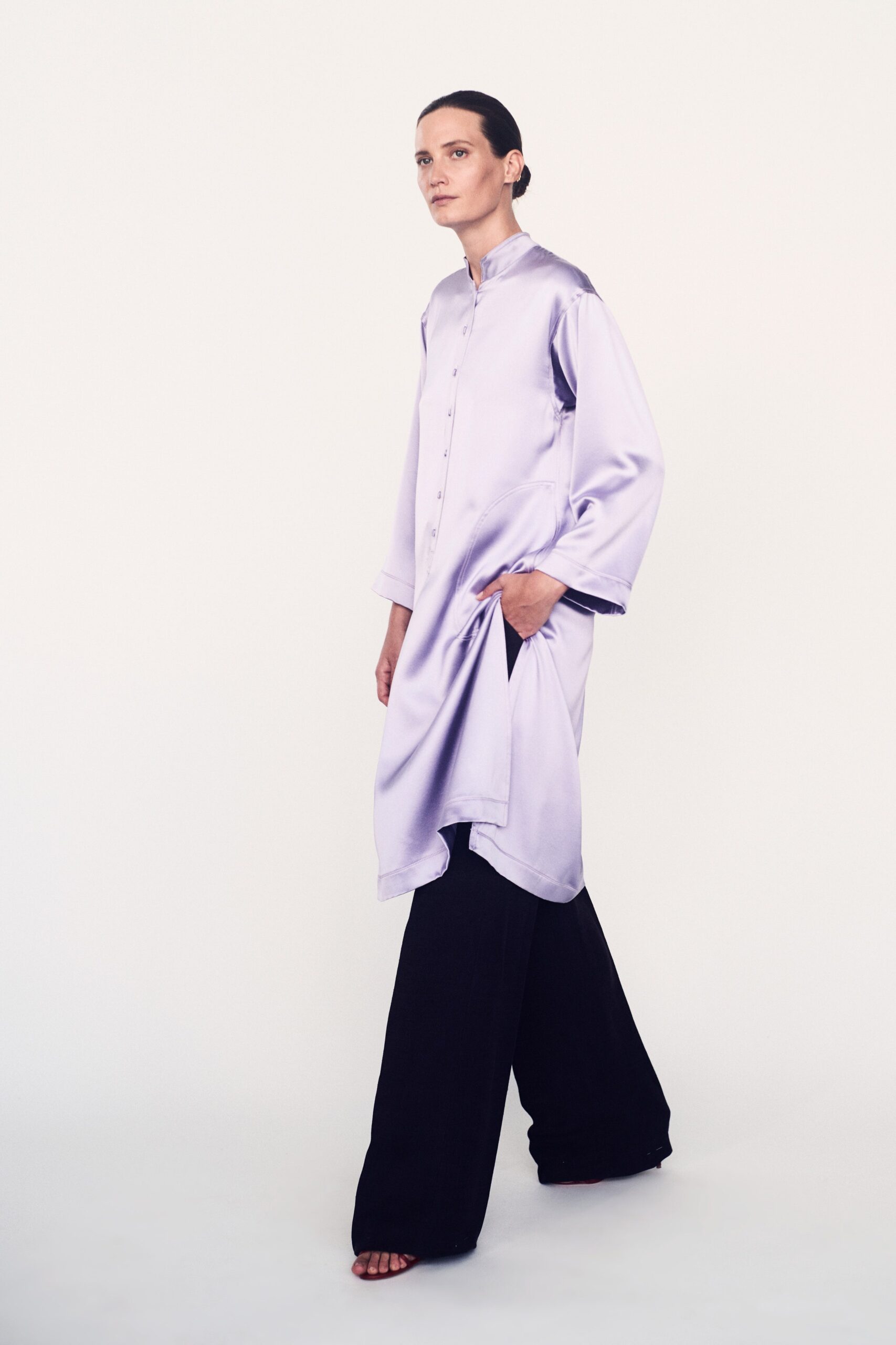 lavender silk top and black wide-leg pants