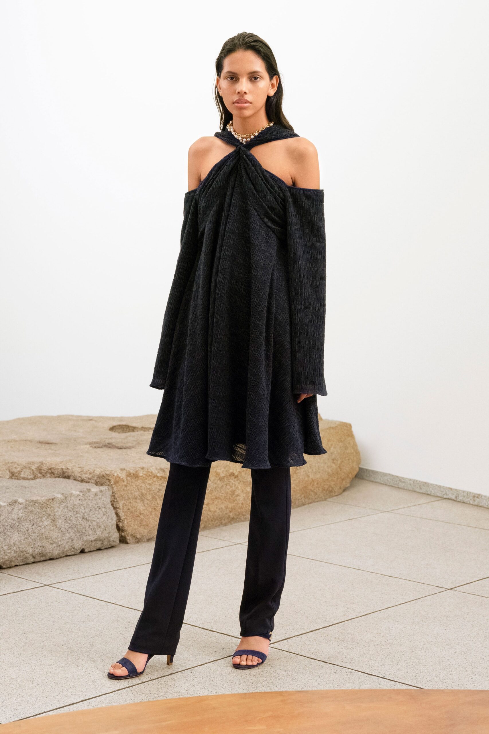 black off-shoulder midi dress with slim pants
