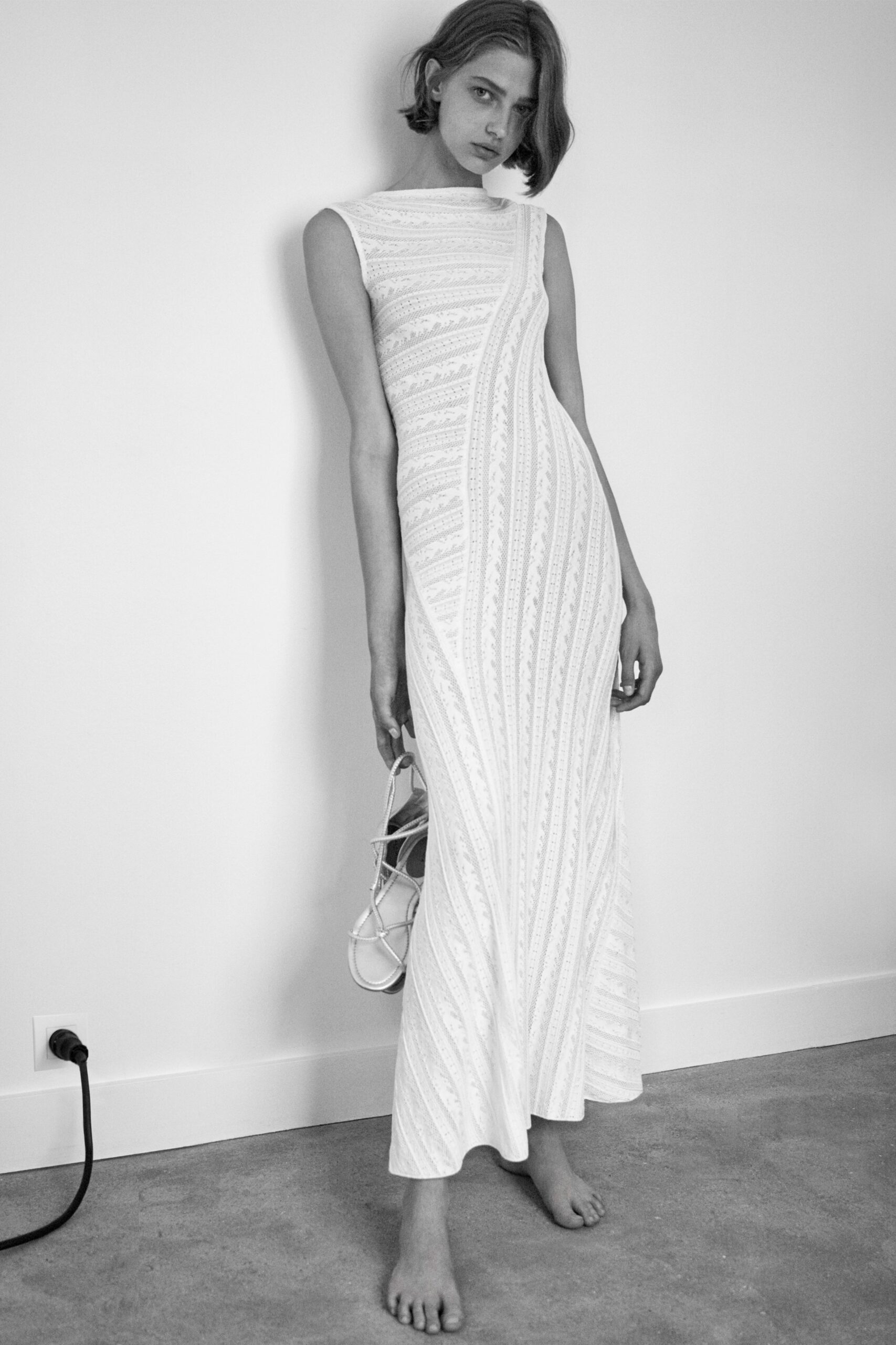 fitted white sleeveless dress