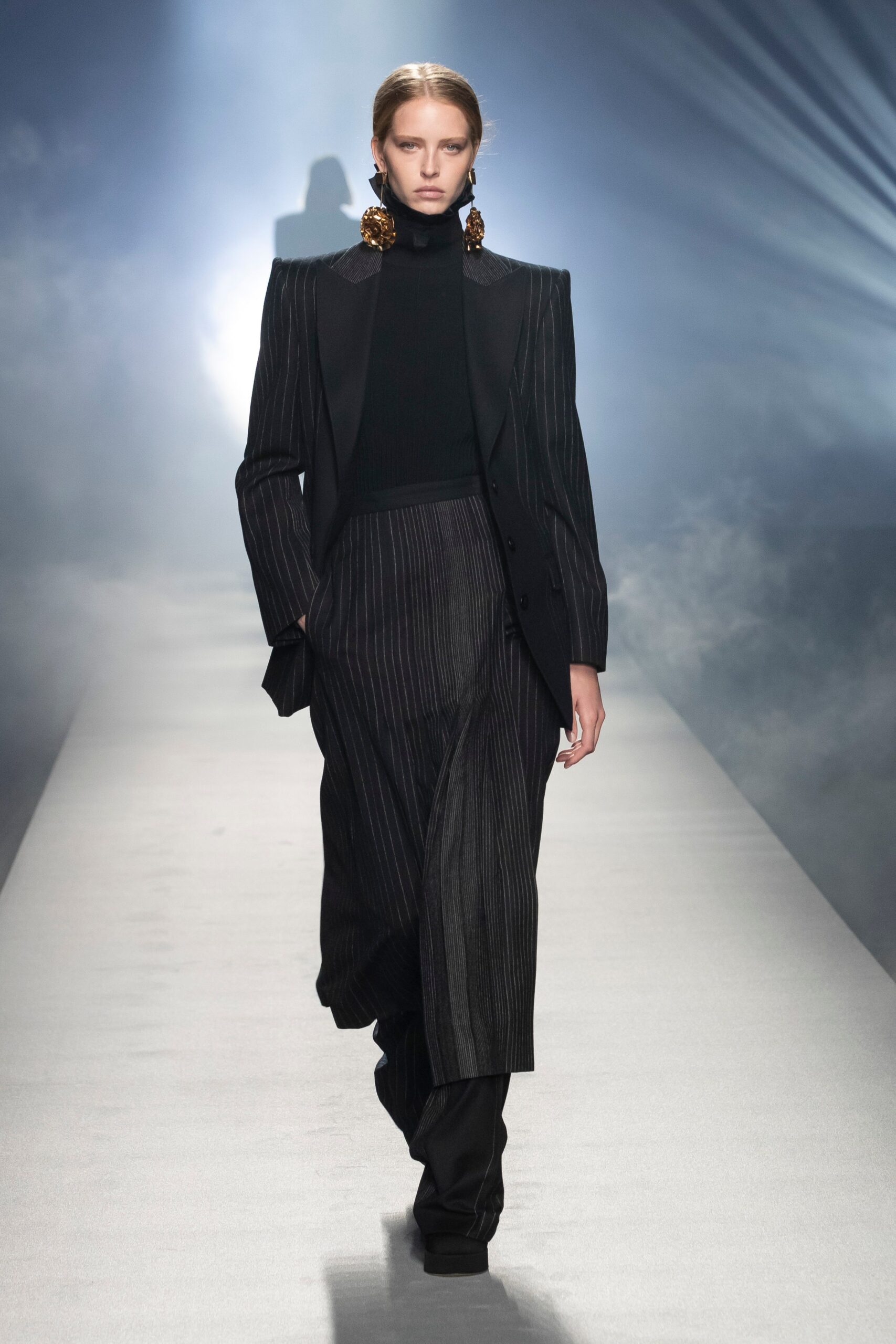 black wool long-sleeve collared tailored structured buttoned blazer