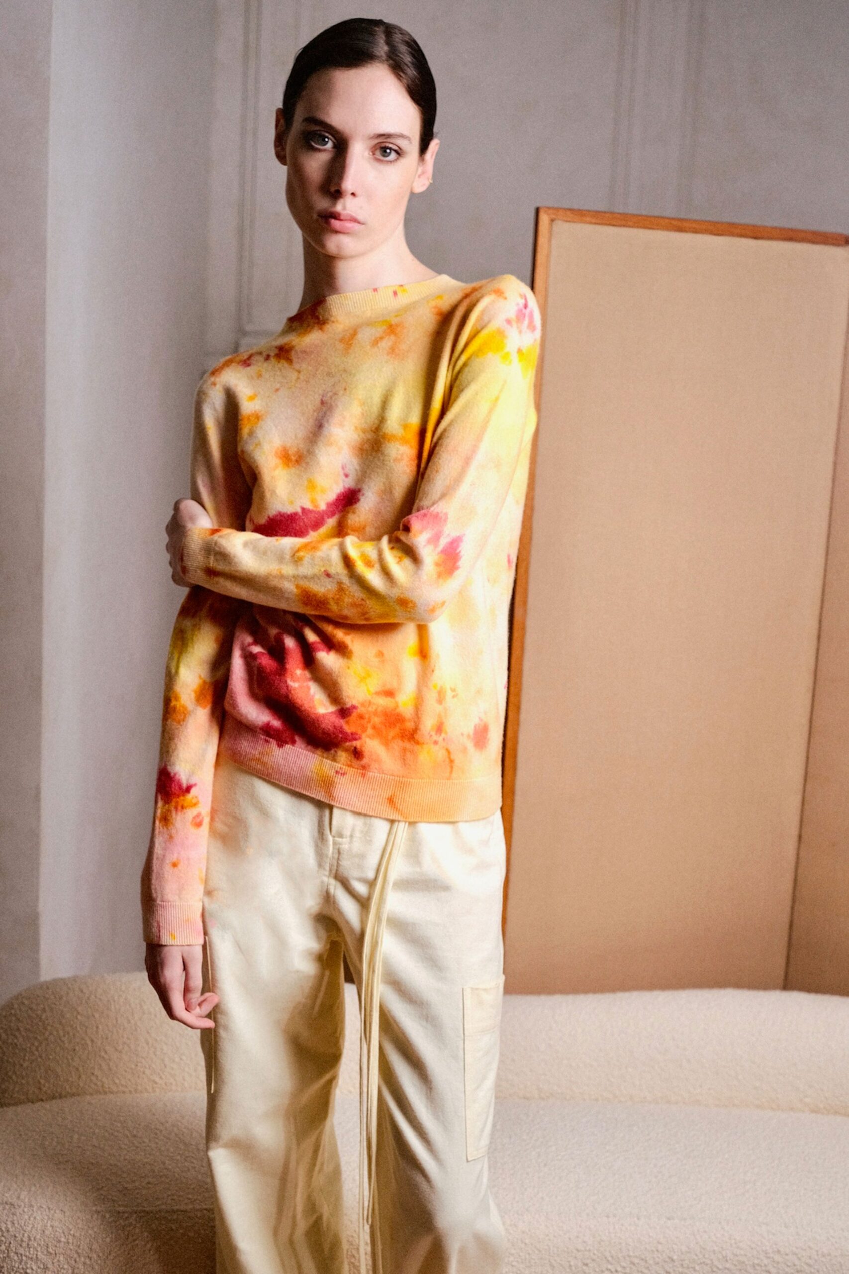 colorful printed sweater and cargo pants