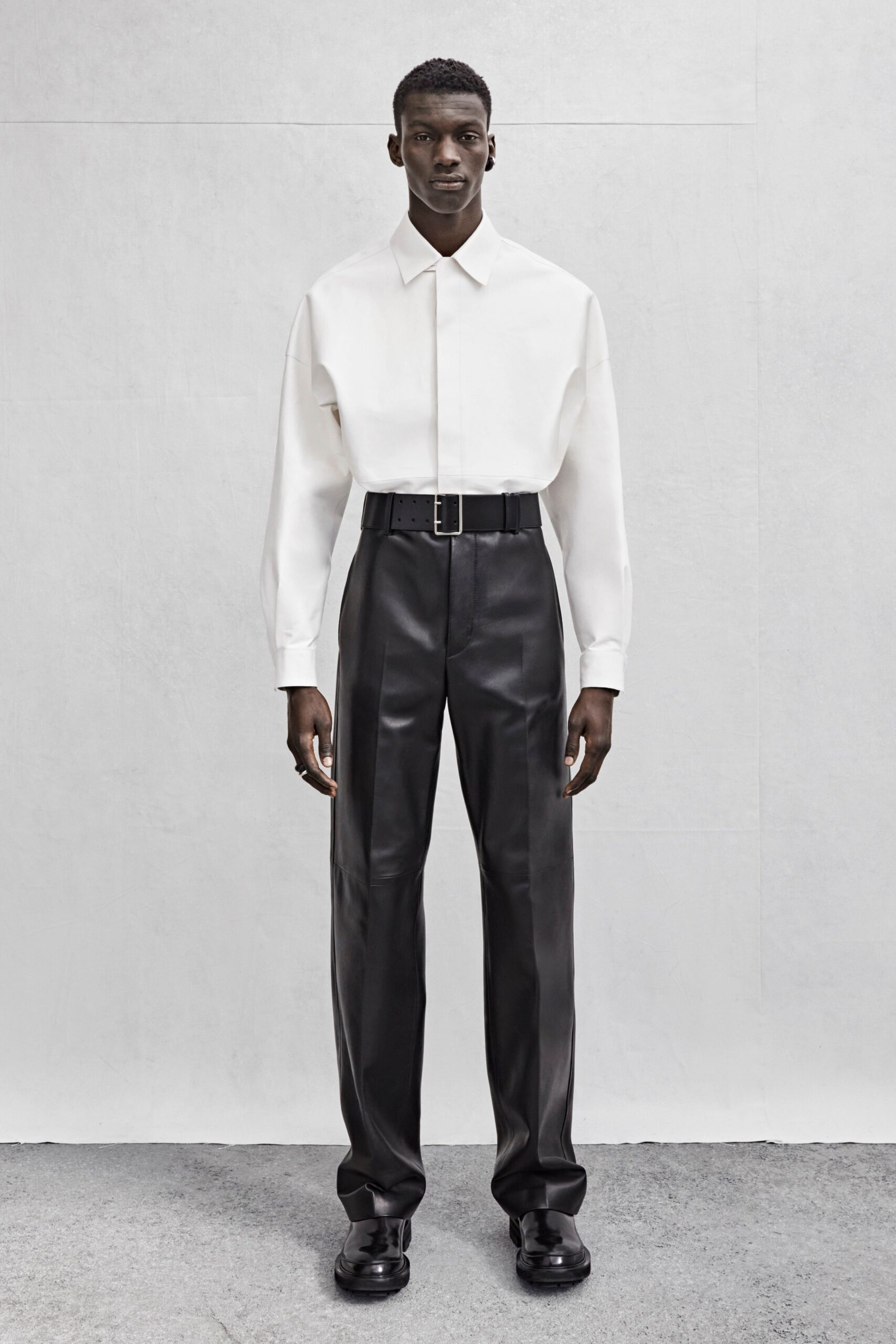 white relaxed shirt black tailored pants
