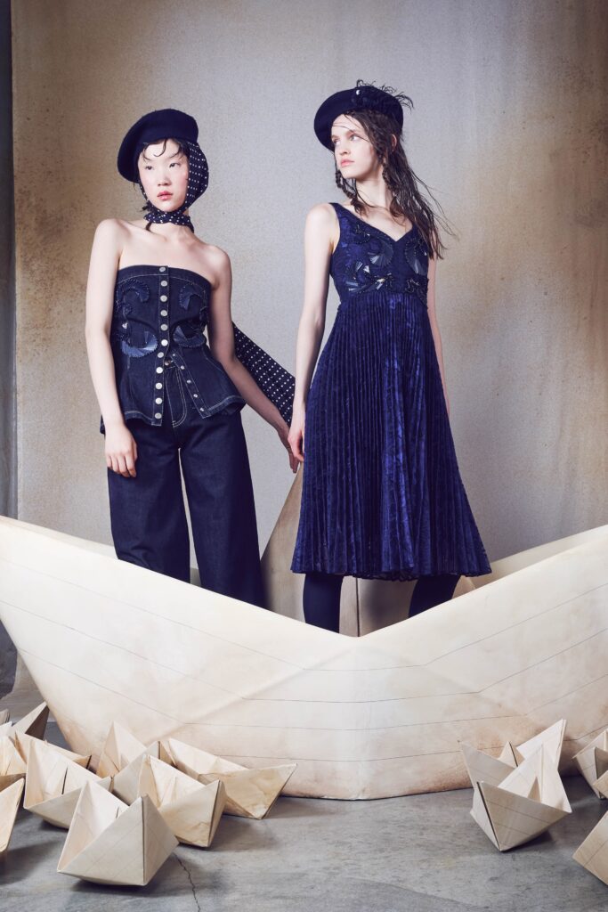 black bustier and blue velvet dress