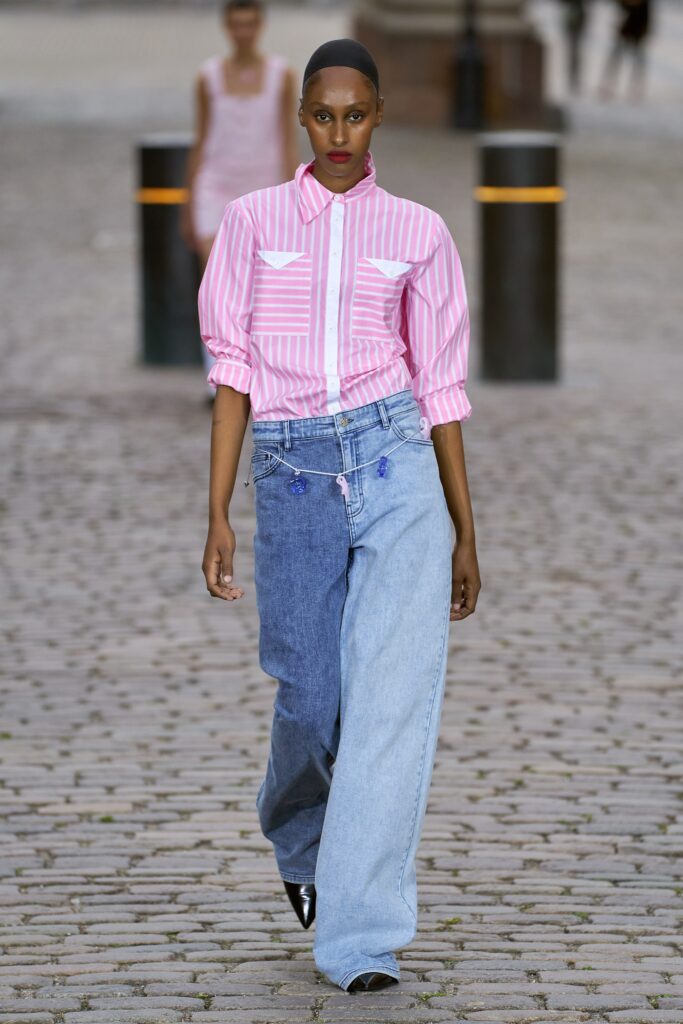 pink striped shirt and blue denim pants