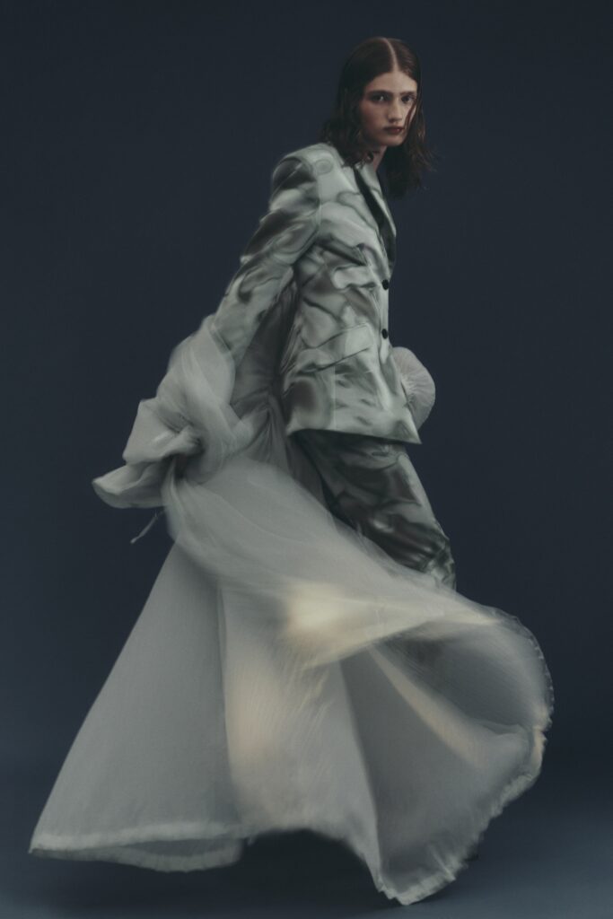 gray silk suit with flowing gown