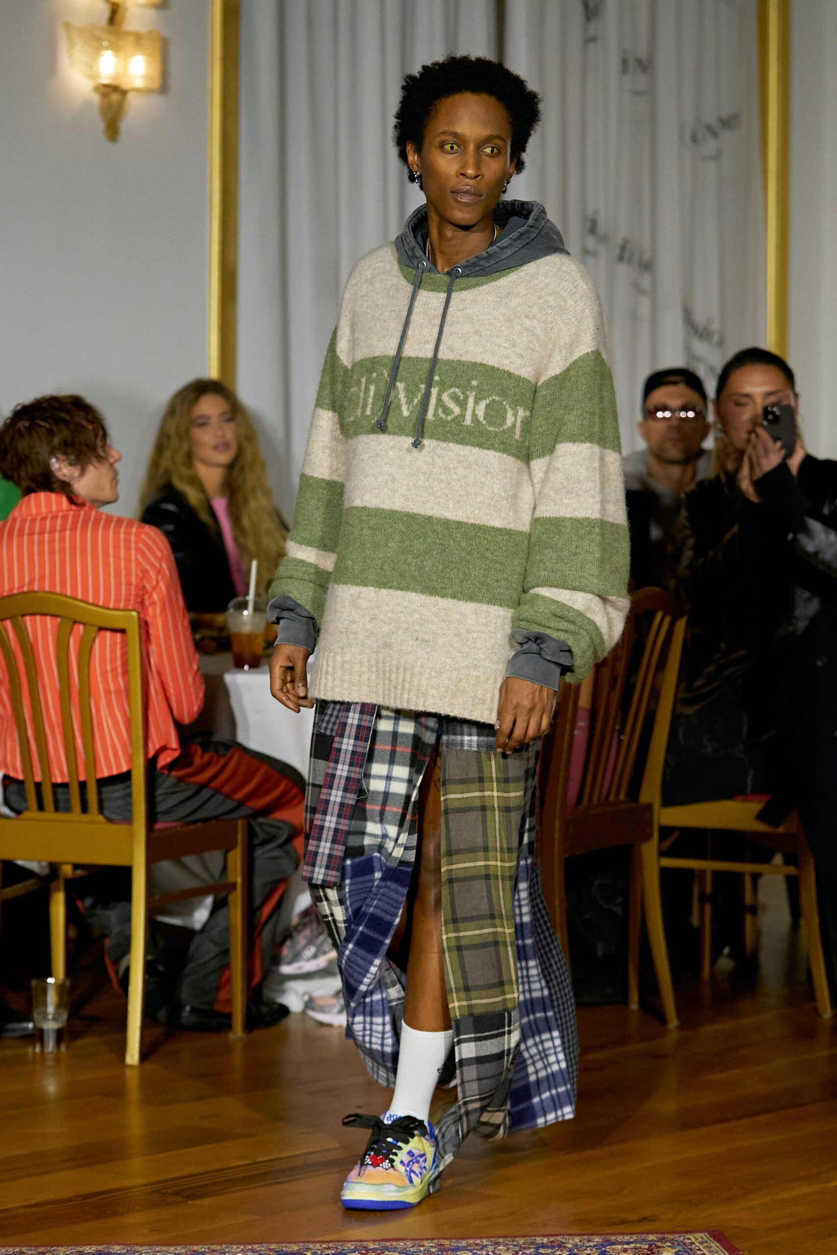 beige striped hoodie with plaid skirt