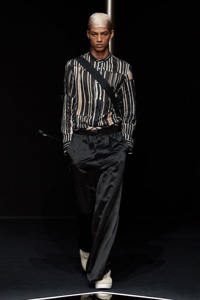 striped black and beige shirt with relaxed pants