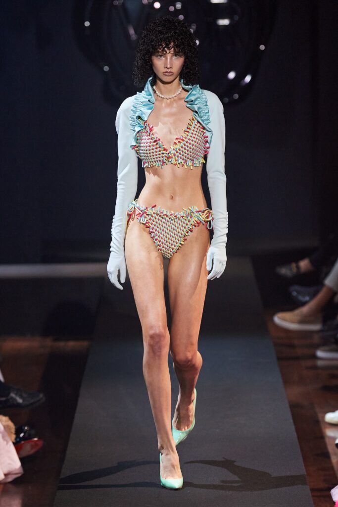 A fitted multicolor bikini with a halter design and fringed detailing.