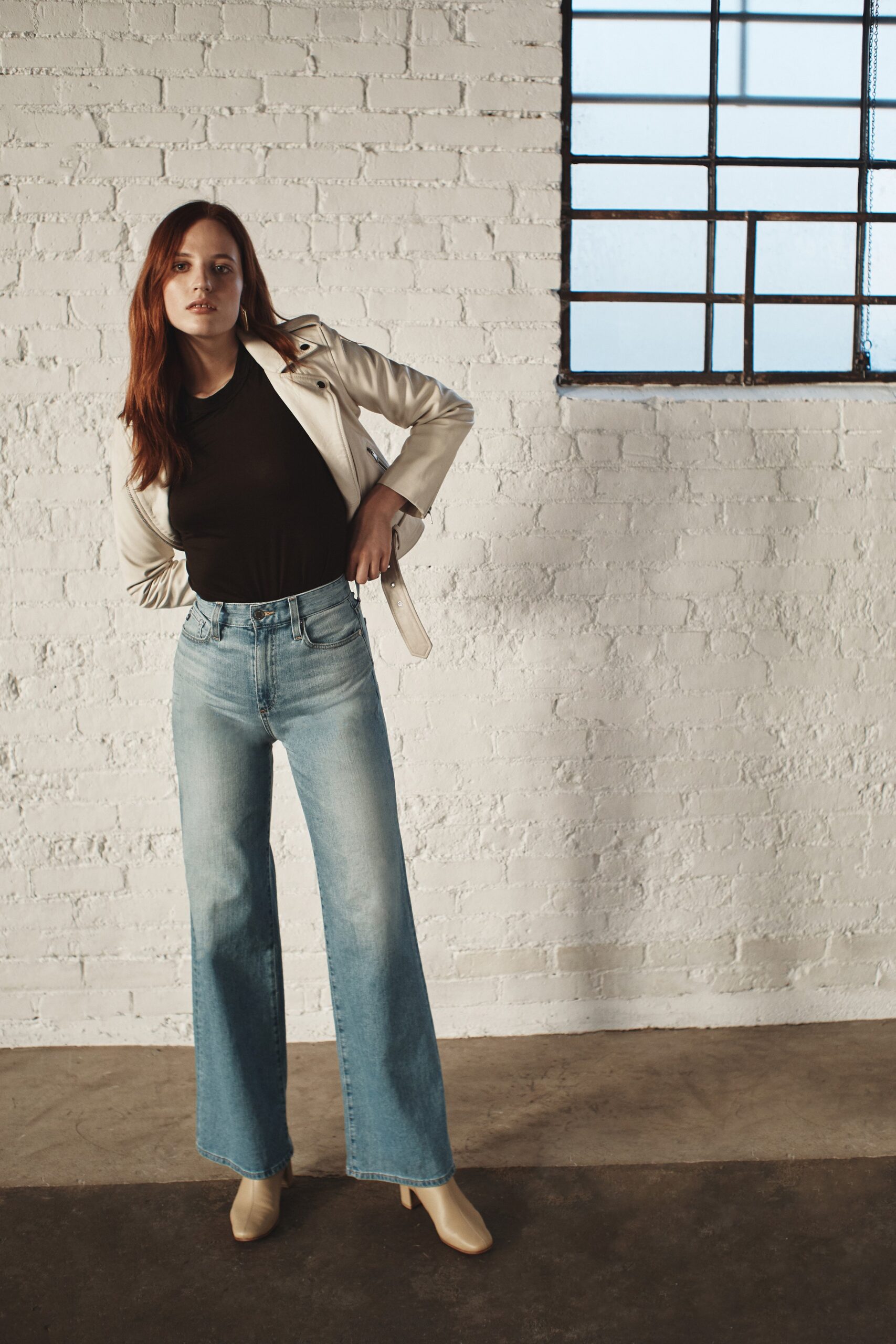 white leather jacket with black top