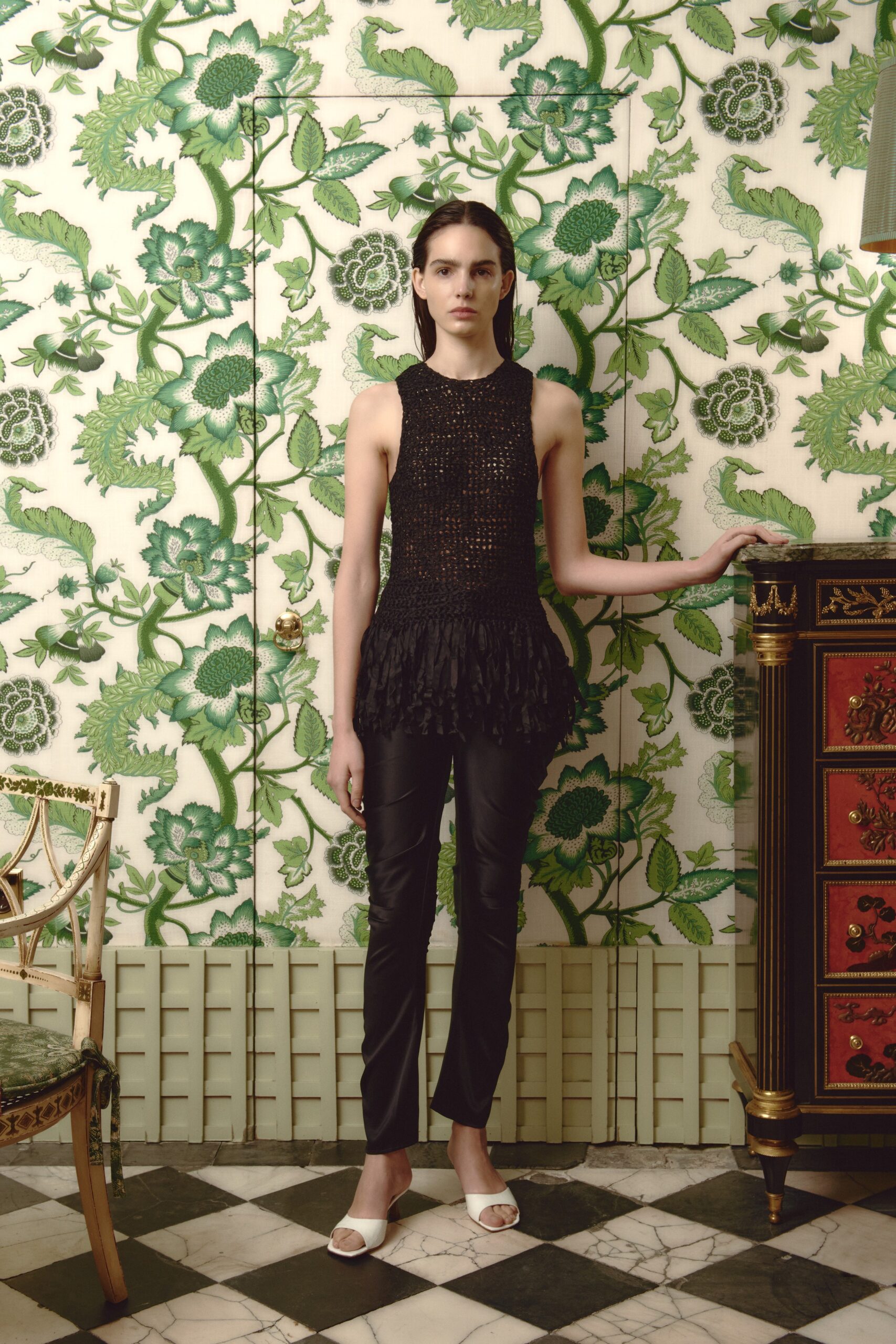 black fitted top with ruffles