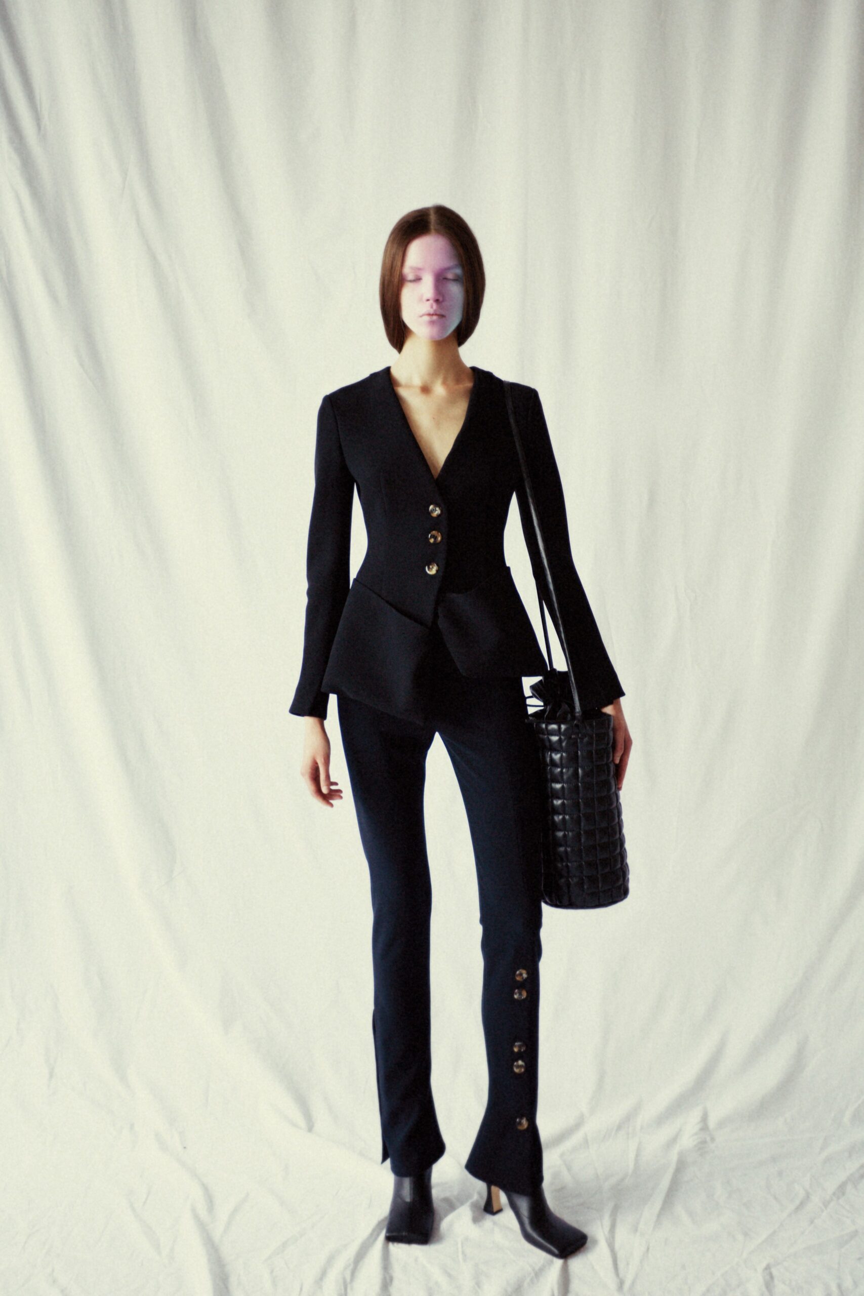 black tailored blazer and fitted pants